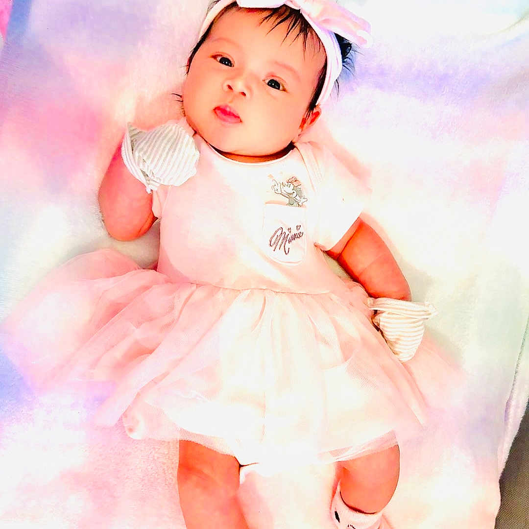 Layna Michaella joined the competition — help win amazing prizes! adorable, baby, baby_girl, blanket, child, clothing, cute, fashion, headband, indoors, infant, lying_down, mittens, pastel, person, pink, portrait, socks, soft, tutu