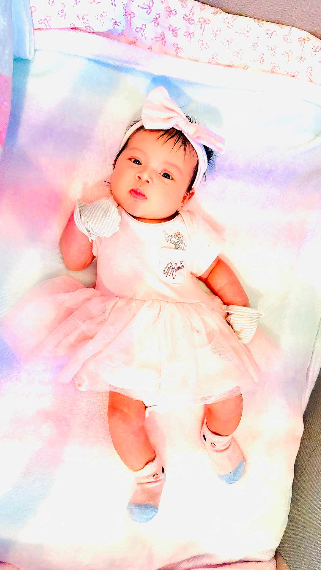 Layna Michaella joined the competition — help win amazing prizes! adorable, baby, baby_girl, blanket, child, clothing, cute, fashion, headband, indoors, infant, lying_down, mittens, pastel, person, pink, portrait, socks, soft, tutu