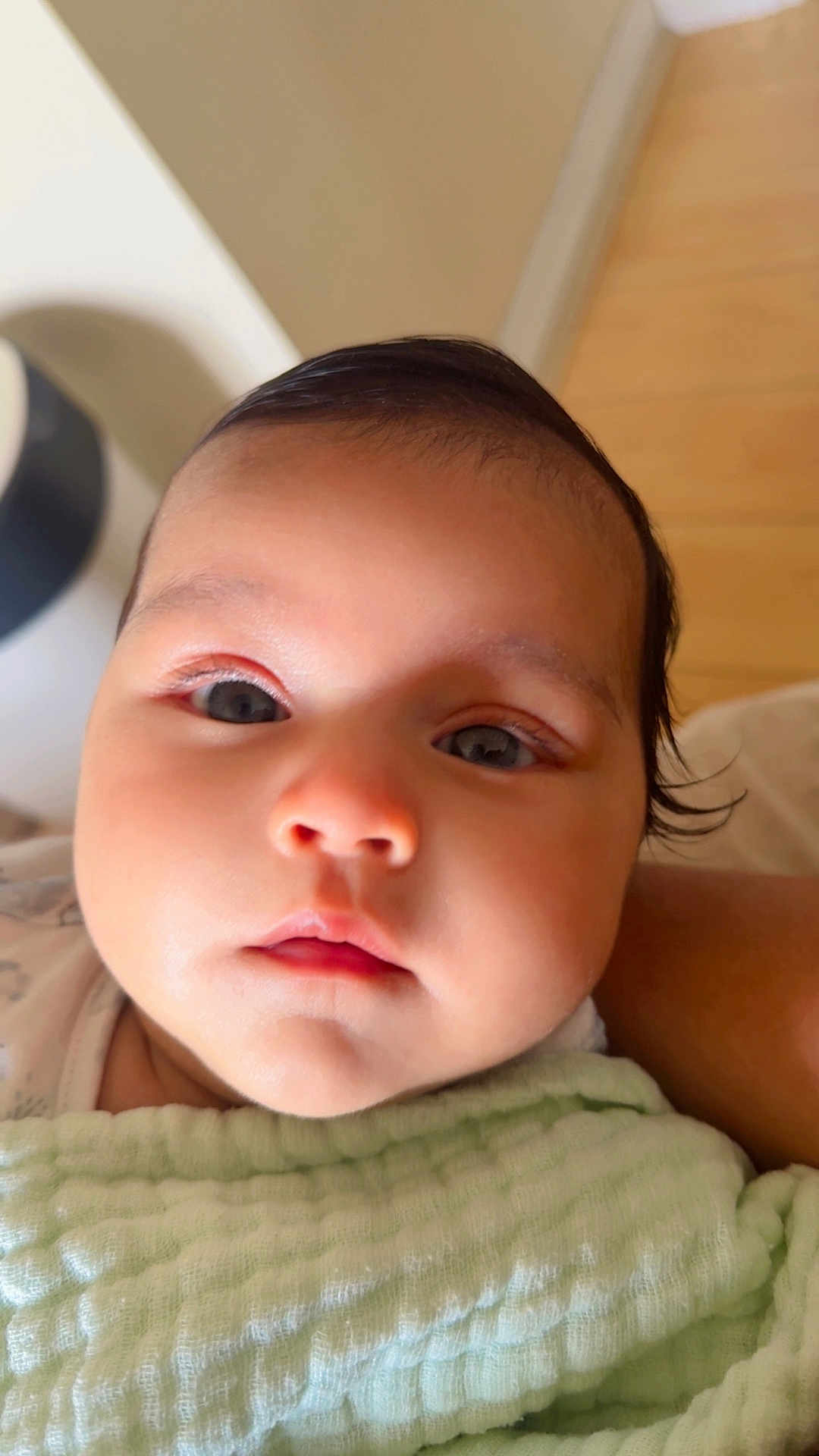 Eiden joined the competition — help win amazing prizes! baby, face, close_up, blanket, infant, cute, child, indoors, skin, head, expression, person, young, portrait, soft, warm, wrapped, comfort, newborn, curious