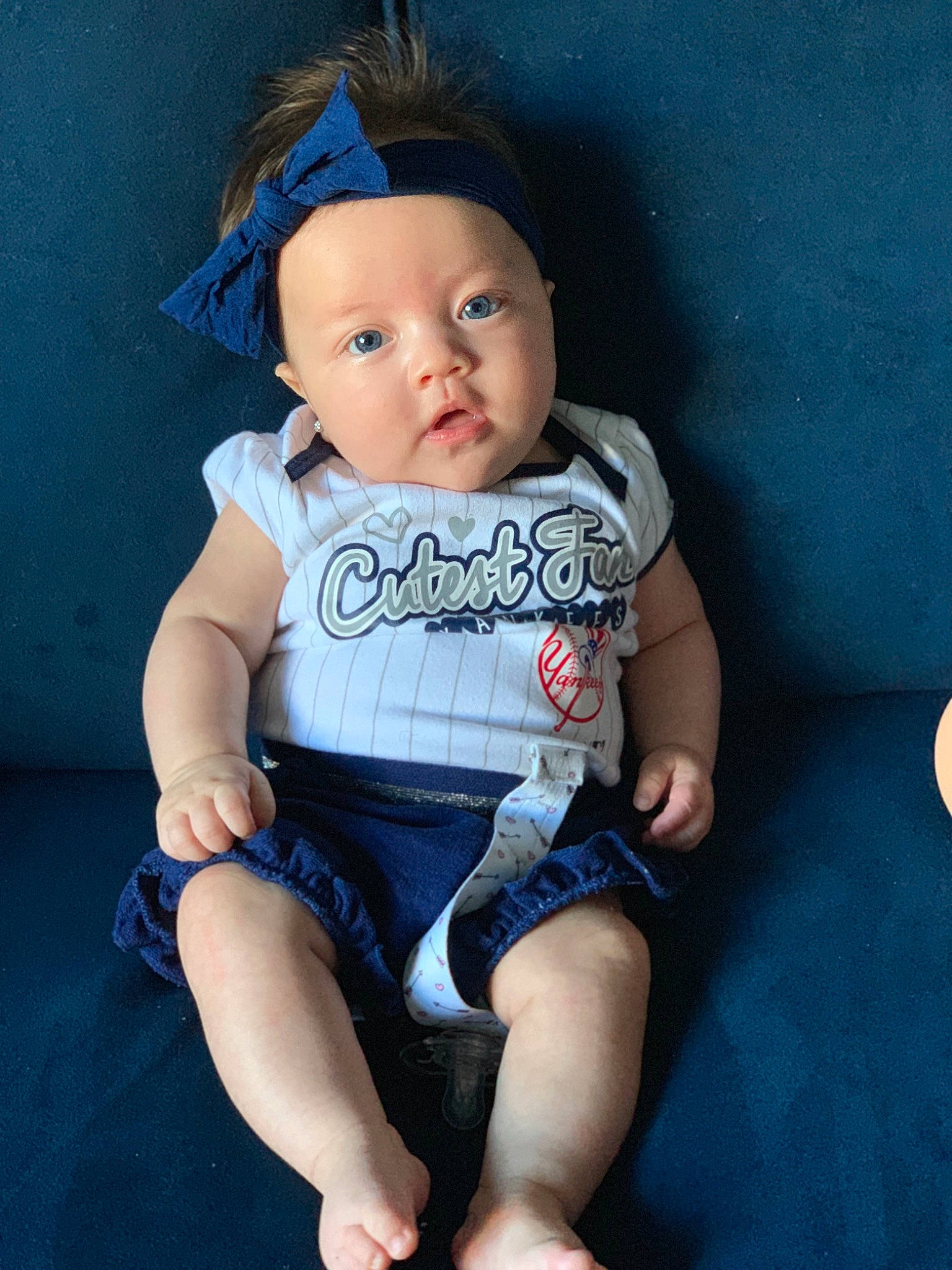Anabella is registered to the contest to win money with this photo: arm, baby, baby_products, baby_toddler_clothing, blue, cheek, child, head, person, product, sitting, skin, sleeve, toddler