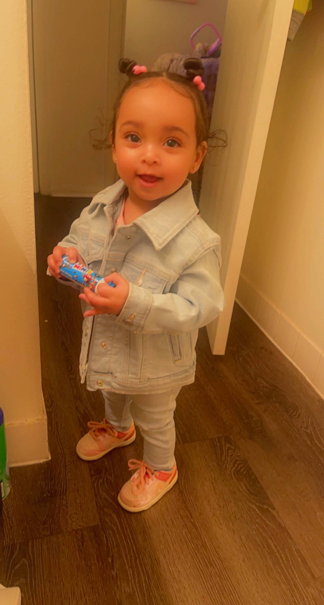 Aubri joined the competition — help win amazing prizes! baby, baby_toddler_clothing, cheek, floor, flooring, foot, fun, hardwood, head, human_body, leg, nose, person, plastic_bottle, skin, sleeve, thumb, toddler, water_bottle, wood