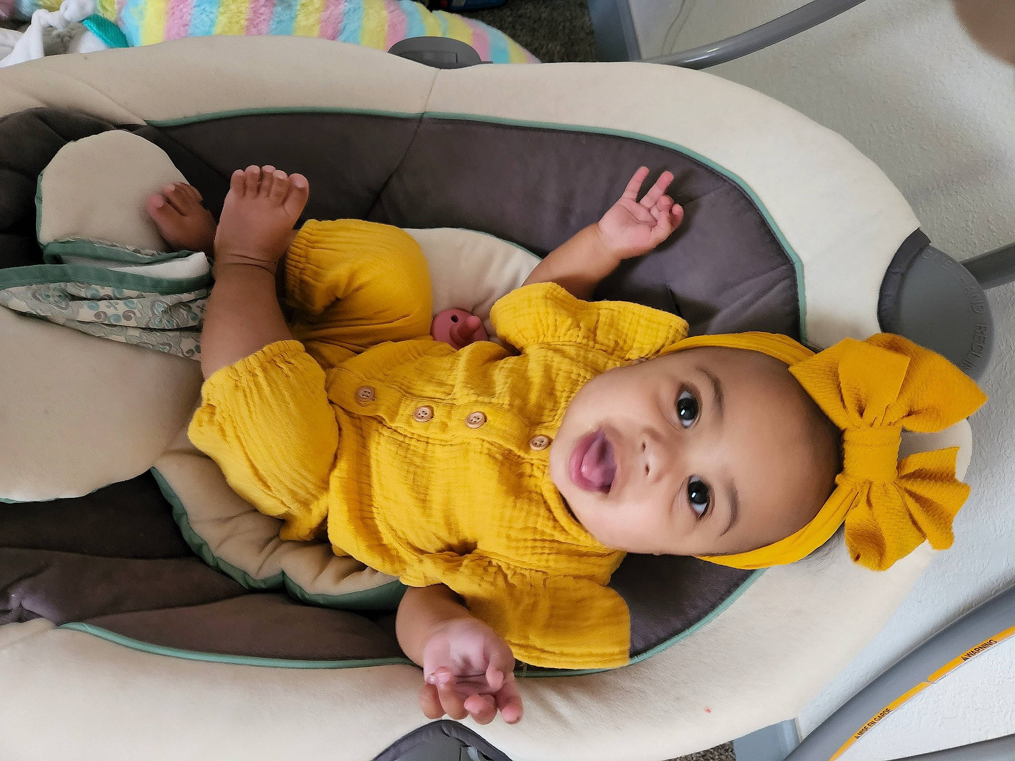 Nova is registered to the contest to win money with this photo: baby, baby_carriage, baby_products, baby_safety, baby_toddler_clothing, cheek, child, comfort, fun, happy, linens, mouth, person, product, room, skin, smile, thigh, toddler, white