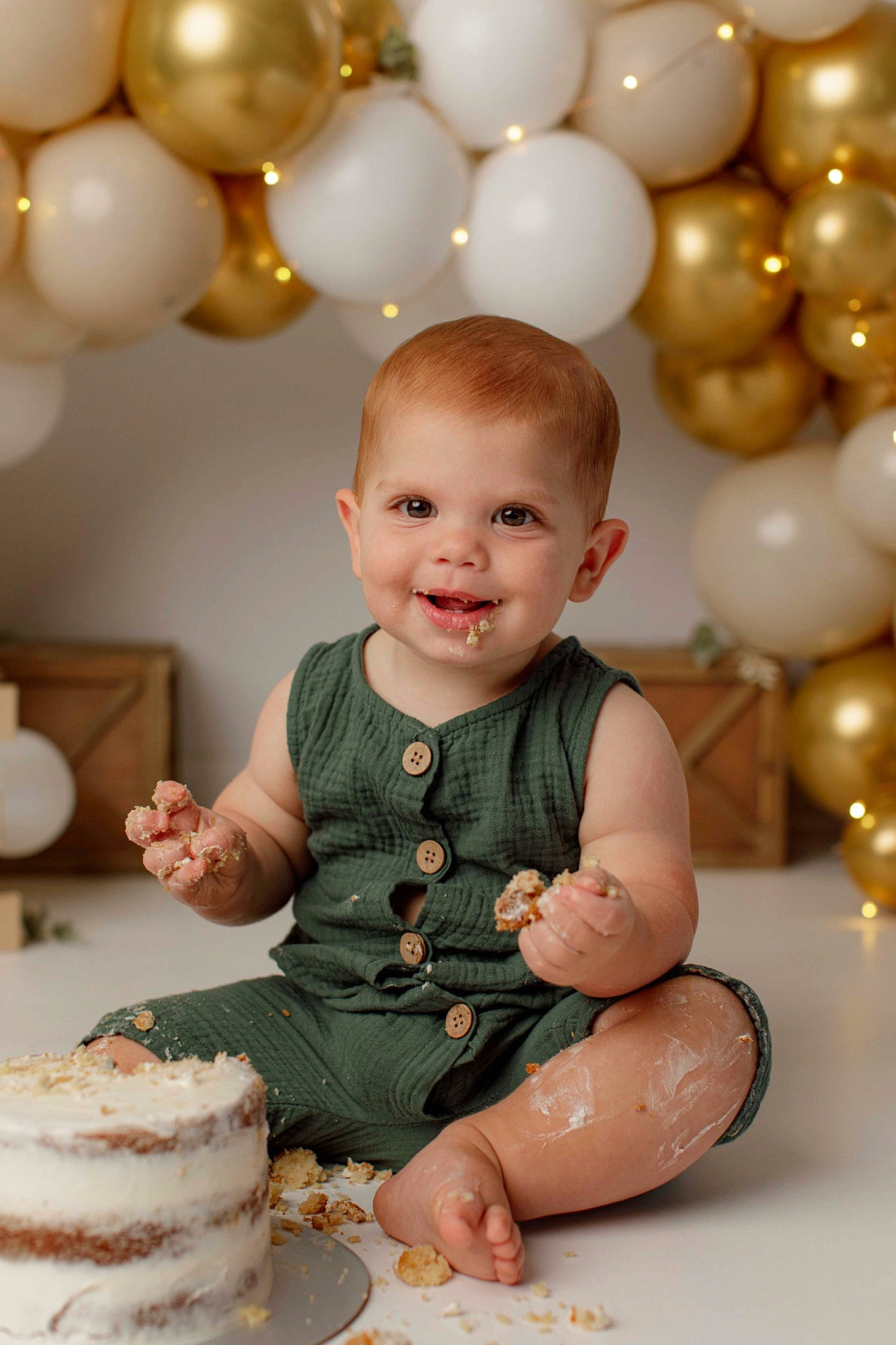 Everett is registered to the contest to win money with this photo: baby, baby_toddler_clothing, balloon, birthday_cake, cake, cake_decorating, chair, child, event, food, fun, happy, joy, party, person, photograph, pink, smile, sugar_cake, tableware