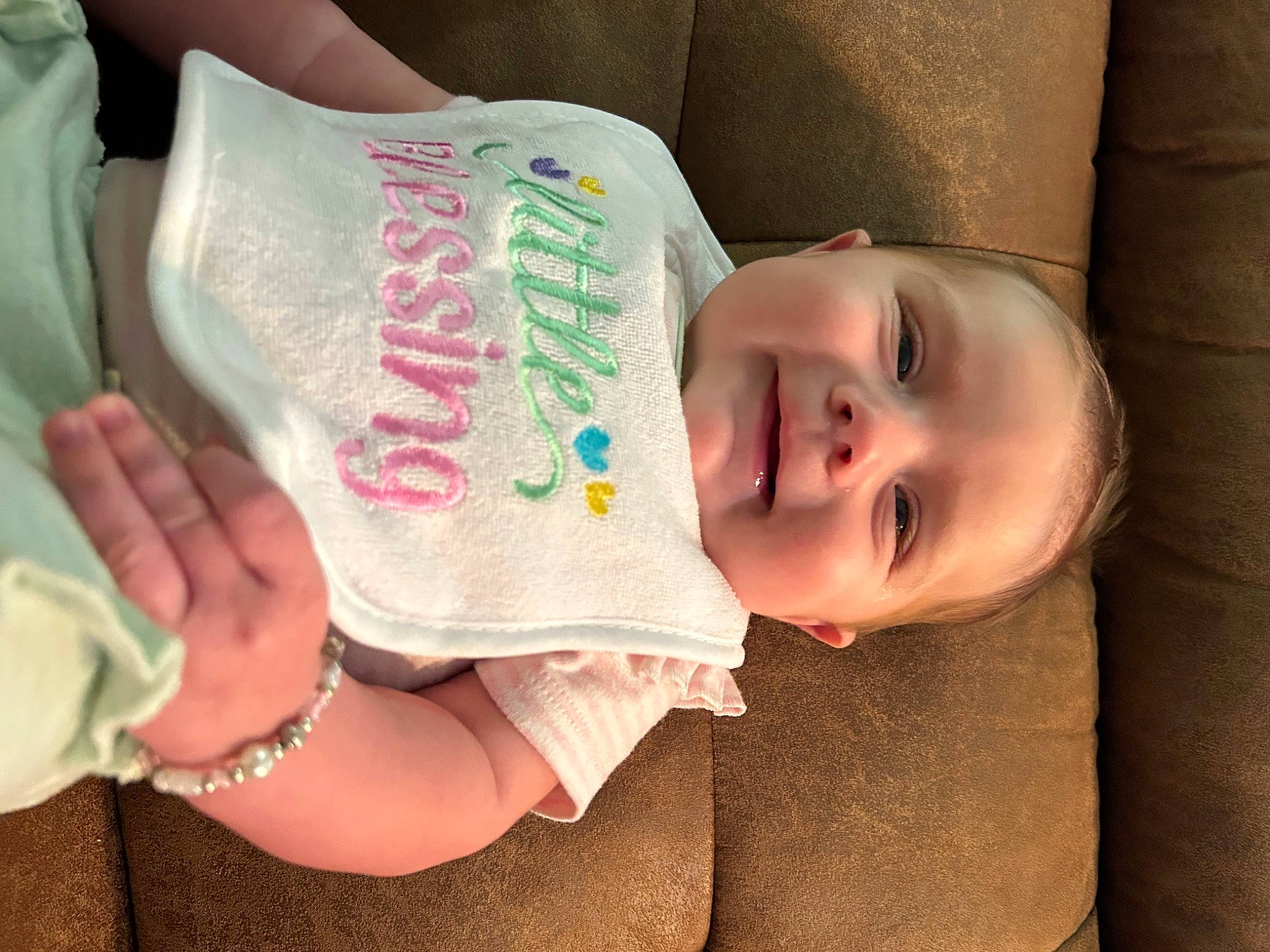 Jayleigh joined the competition — help win amazing prizes! baby, baby_toddler_clothing, bracelet, child, comfort, drinkware, eyelash, hand, happy, human_body, jewellery, joy, linens, mouth, nail, pattern, person, skin, smile, textile
