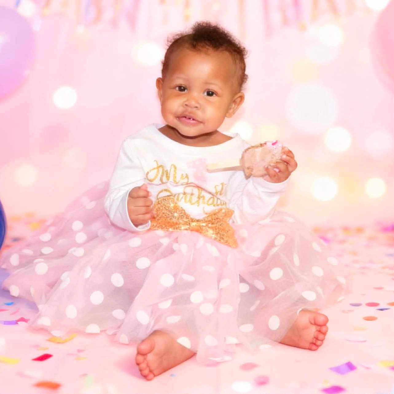 Sa'Ryiiah joined the competition — help win amazing prizes! baby, child, birthday, cake, pink, balloons, confetti, dress, polka_dot, celebration, smile, happy, cute, party, tutu, sitting, indoors, festive, young, portrait