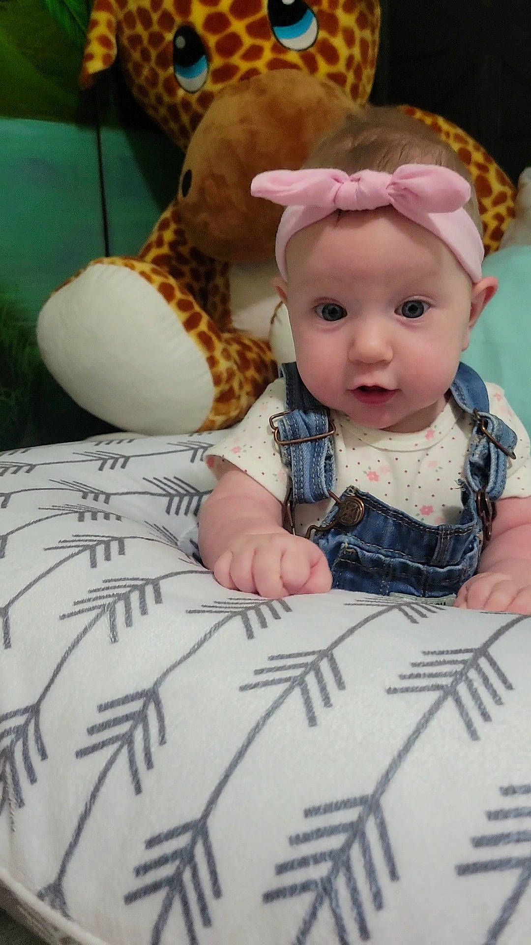 Sawyer joined the competition — help win amazing prizes! baby, baby_toddler_clothing, cheek, child, doll, dress, eye, eyelash, fawn, headwear, iris, linens, mammal, pattern, person, sitting, sleeve, toddler, toy, vertebrate