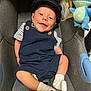 Naëllio a rejoint le concours — aidez-le/la à gagner de superbes lots ! baby, smile, romper, cap, socks, car_seat, plush_toy, stitch, child, happy, infant, cute, indoor, clothing, person, seat, toy, fabric, comfort, playful