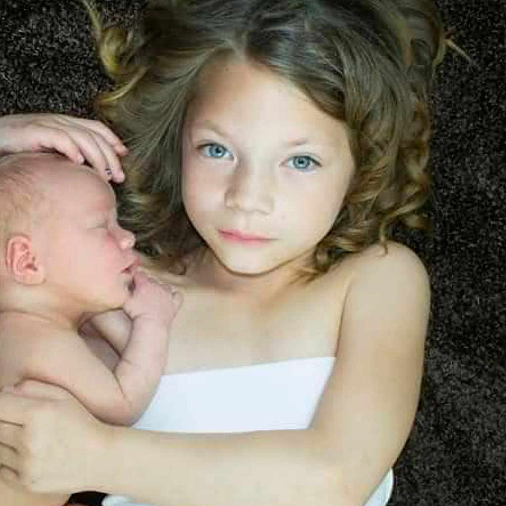Hayden is registered to the contest to win money with this photo: beauty, cheek, child, child_model, daughter, eye, face, gesture, hair, long_hair, mother, nose, person, photo_caption, photograph, photography, portrait, portrait_photography, skin, smile
