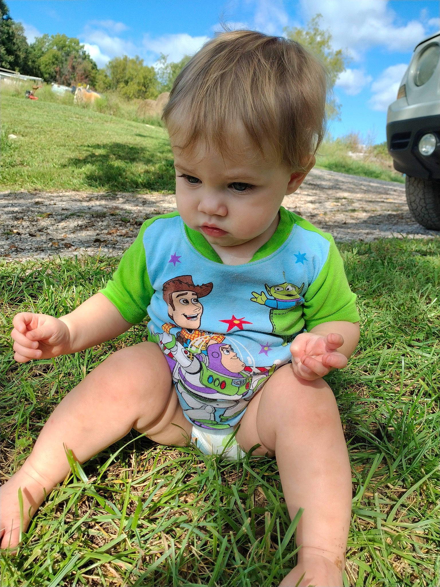 Jenna joined the competition — help win amazing prizes! baby_toddler_clothing, blue, child, cloud, facial_expression, fun, grass, grass_family, grassland, happy, leisure, meadow, people, people_in_nature, person, plant, skin, sky, summer, toddler
