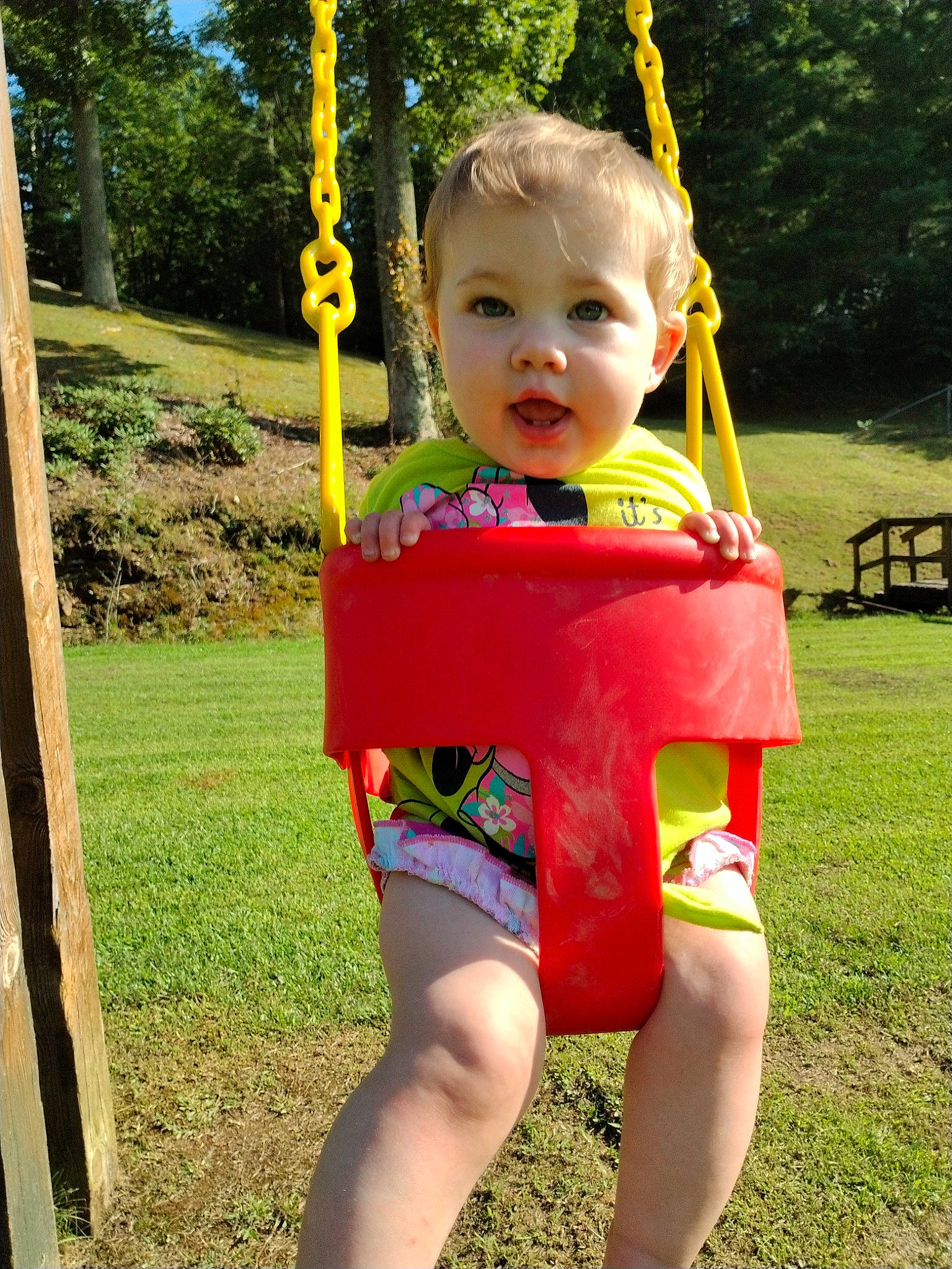 Jenna joined the competition — help win amazing prizes! baby, baby_toddler_clothing, bench, child, electric_blue, fun, grass, happy, leisure, outdoor_bench, people_in_nature, person, plant, play, playground, recreation, smile, swing, toddler, tree