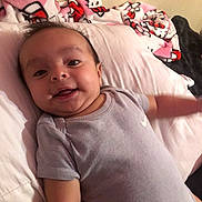 Nico joined the competition — help win amazing prizes! baby, smiling, infant, bed, blanket, hello_kitty, clothing, pillow, cute, happy, face, child, indoor, person, young, portrait, soft, toddler, lying_down, comfortable