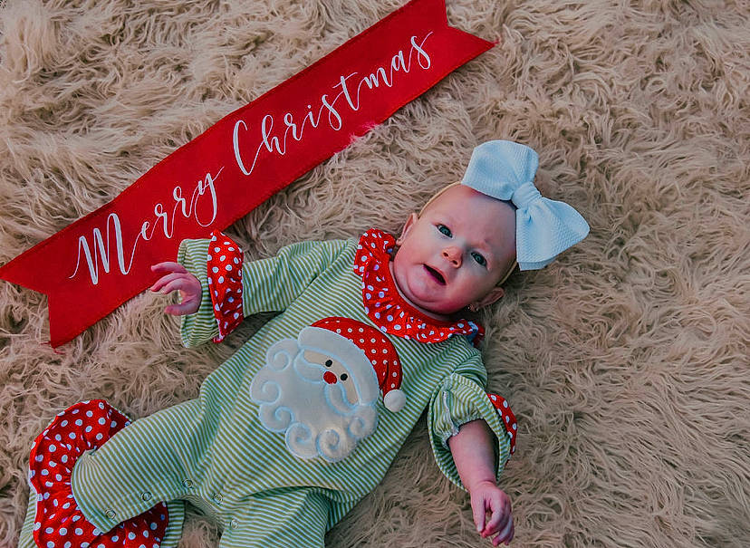 Brinleigh Kate is registered to the contest to win money with this photo: baby, baby_toddler_clothing, child, christmas, happy, holiday, pattern, person, sleeve, smile, toddler