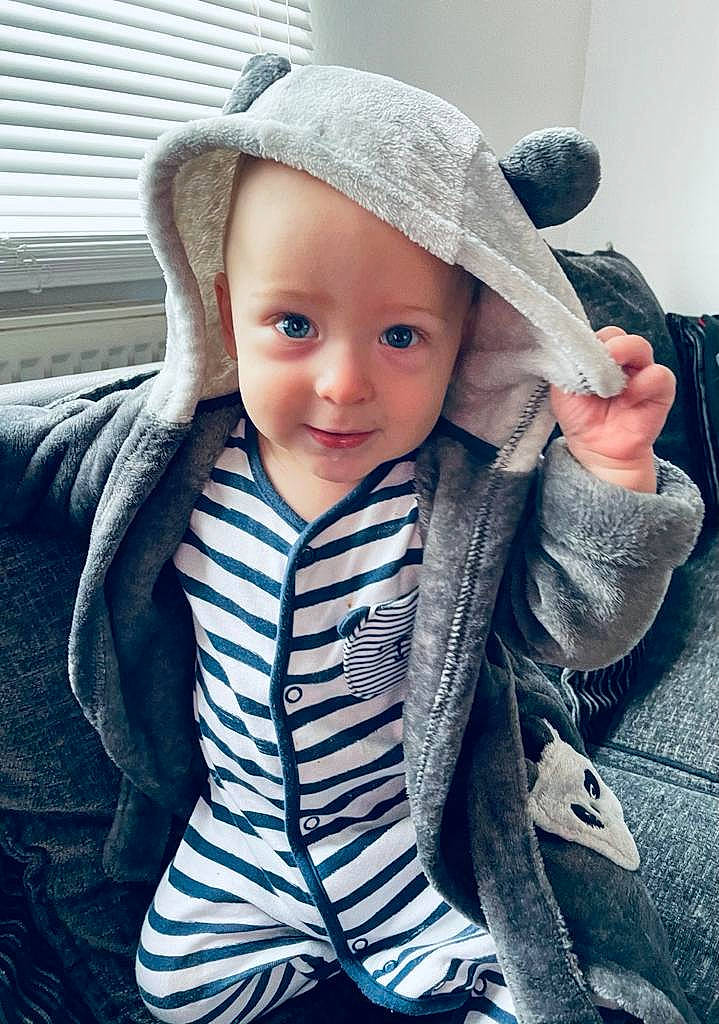 Dominik joined the competition — help win amazing prizes! baby, cheek, child, child_model, cool, eye, fashion_accessory, hat, head, headgear, headwear, hoodie, knitting, outerwear, person, photography, portrait_photography, sitting, skin, toddler