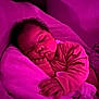baby, sleeping, blanket, infant, child, soft, cozy, pink_light, indoors, rest, peaceful, cute, hand, face, curly_hair, pajamas, portrait, resting, toddler, comfort