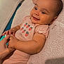 Amayathist joined the competition — help win amazing prizes! baby, infant, smiling, onesie, strawberries, blanket, hand, cozy, cute, child, person, skin, sleepwear, lying_down, happy, soft, comfort, closeup, indoor, toddler