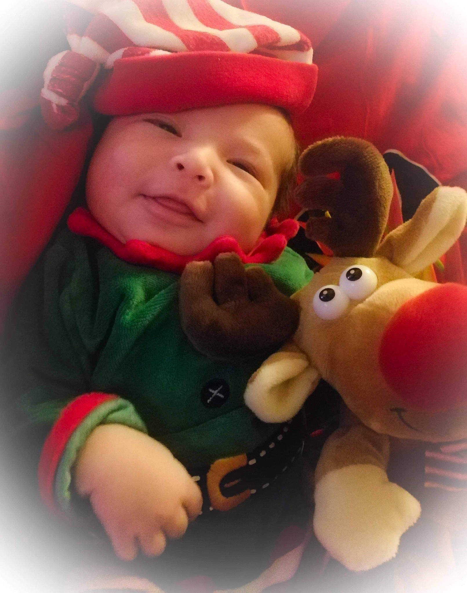 Marcus participe au concours pour gagner de l'argent avec cette photo : cheek, child, ear, finger, fun, happiness, infant, material, person, pink, play, plush, product, red, skin, smile, stuffed_toy, textile, toddler, toy