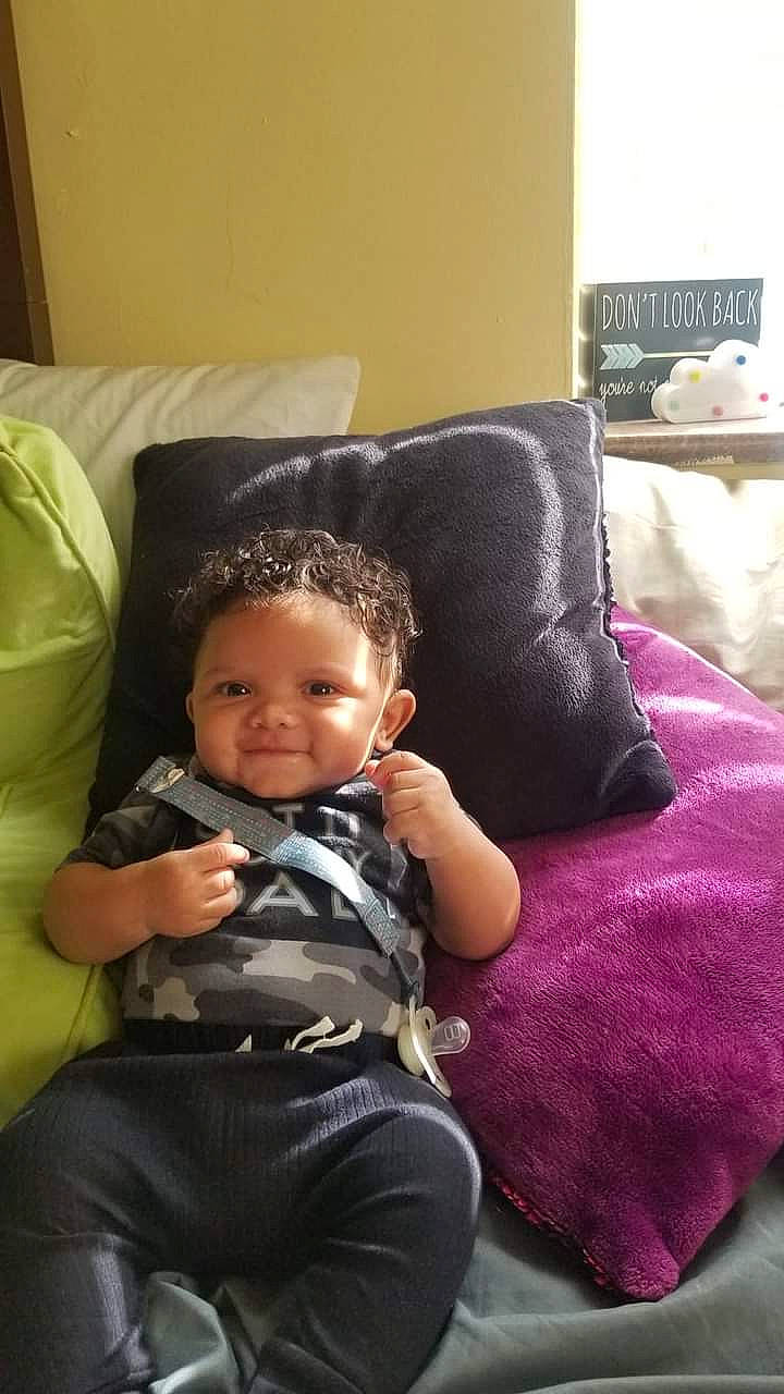 Hendrex joined the competition — help win amazing prizes! baby, baby_toddler_clothing, chair, child, comfort, couch, flooring, fun, happy, joy, lap, living_room, magenta, person, pillow, purple, room, sitting, smile, throw_pillow