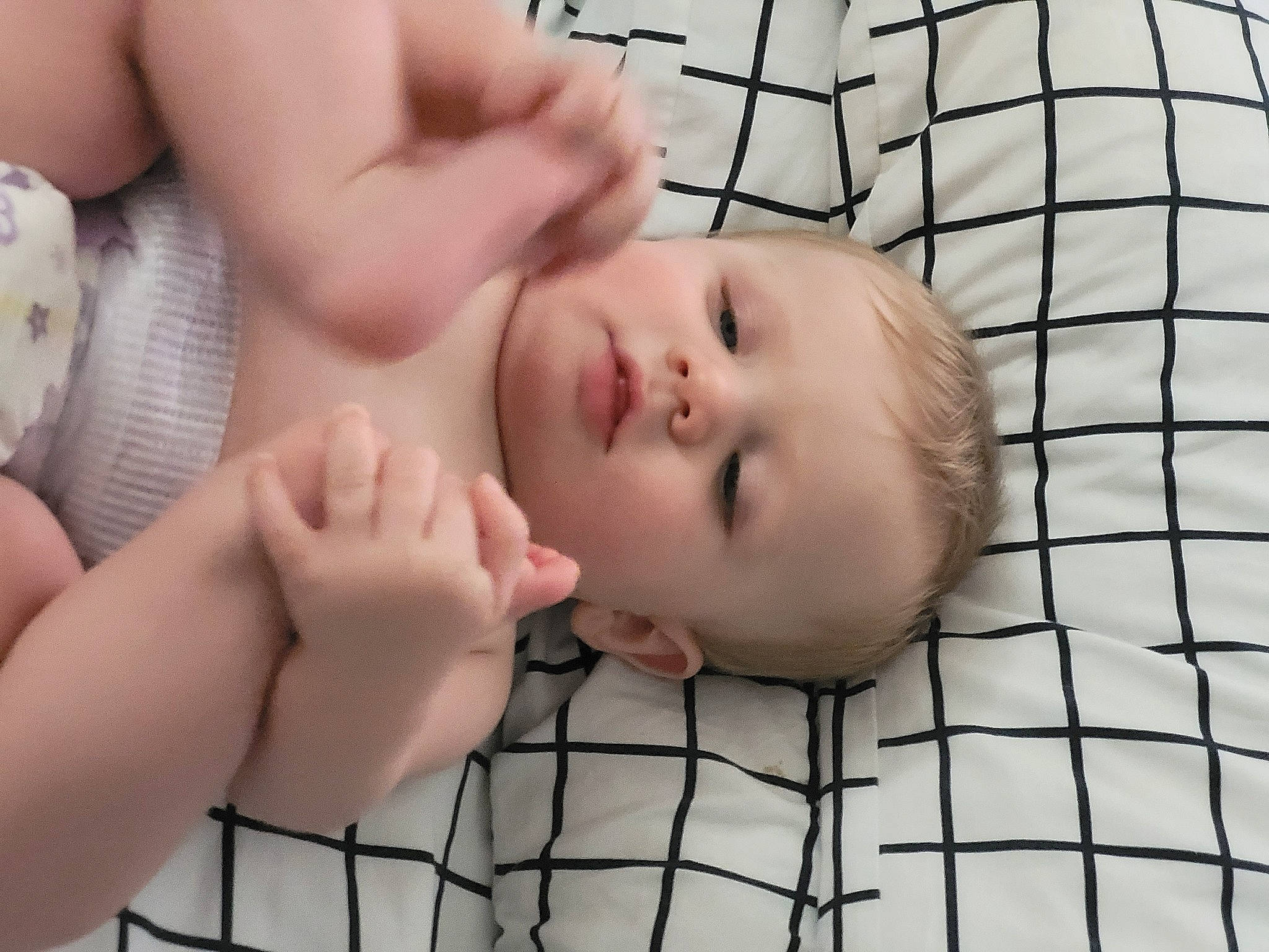 Killian is registered to the contest to win money with this photo: baby, baby_products, baby_toddler_clothing, cheek, chin, comfort, eye, eyelash, face, finger, gesture, head, mouth, nail, nose, person, skin, sleeve, thumb, toddler