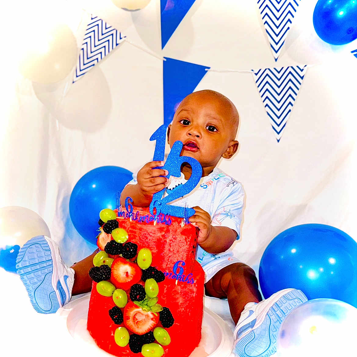 Daharei joined the competition — help win amazing prizes! baby, balloons, birthday, blackberries, blue, cake, celebration, child, fruit, grapes, indoor, milestone, numbers, party, pennants, smiling, sneakers, strawberries, watermelon, white