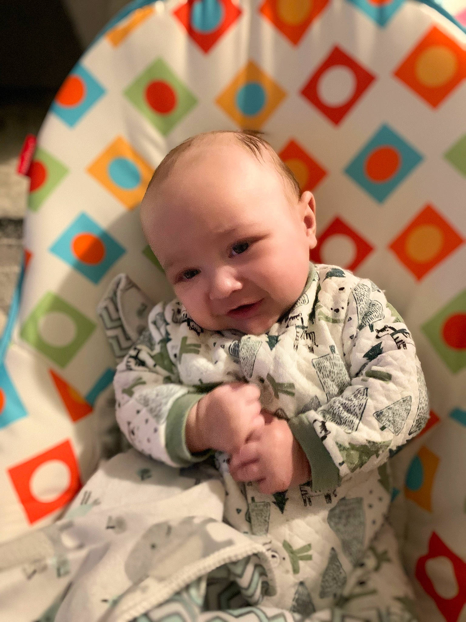 Jasiah joined the competition — help win amazing prizes! baby, baby_toddler_clothing, camouflage, cheek, child, collar, comfort, eye, gesture, hairstyle, head, linens, military_camouflage, pattern, person, sitting, skin, sleeve, smile, textile