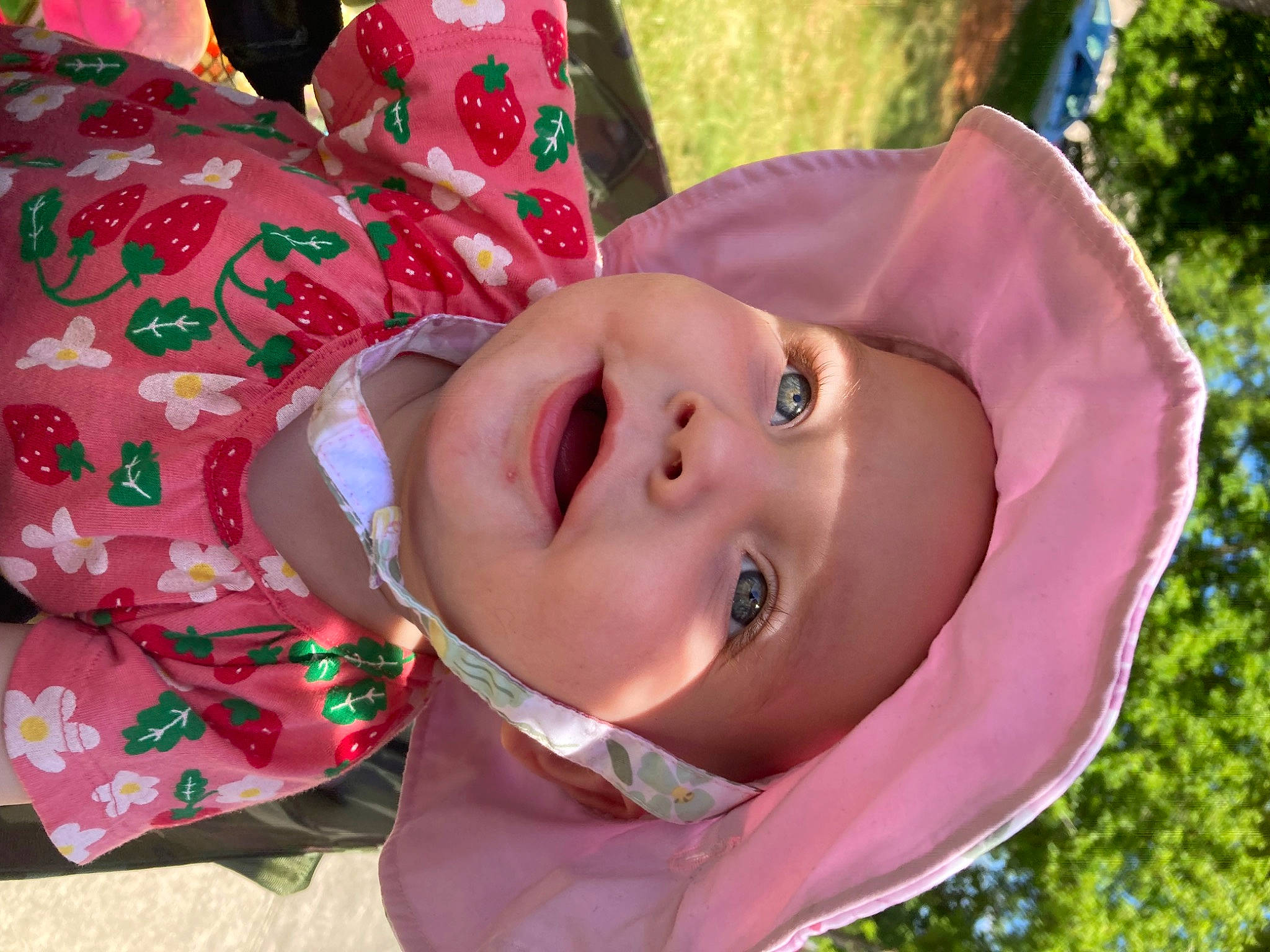 Emilie joined the competition — help win amazing prizes! baby, baby_toddler_clothing, cheek, child, eye, eyebrow, eyelash, fashion_accessory, grass, happy, head, headwear, leisure, lip, nose, people_in_nature, person, pink, plant, smile