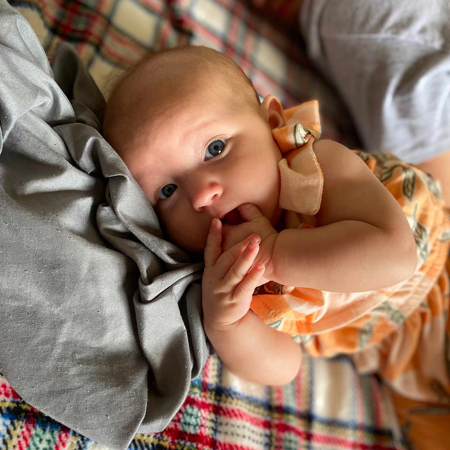 Lakelyn Starr is registered to the contest to win money with this photo: baby, baby_products, baby_toddler_clothing, bedtime, cheek, child, comfort, gesture, happy, linens, pattern, plaid, room, sitting, skin, sleep, tartan, textile, toddler, wood