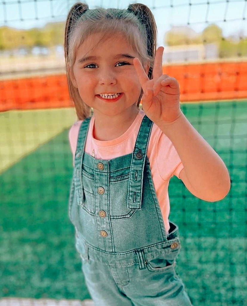 Blakely joined the competition — help win amazing prizes! baby, baby_toddler_clothing, child, fence, fun, gesture, grass, happy, joy, leisure, net, pattern, people_in_nature, person, play, player, recreation, skin, sleeve, smile