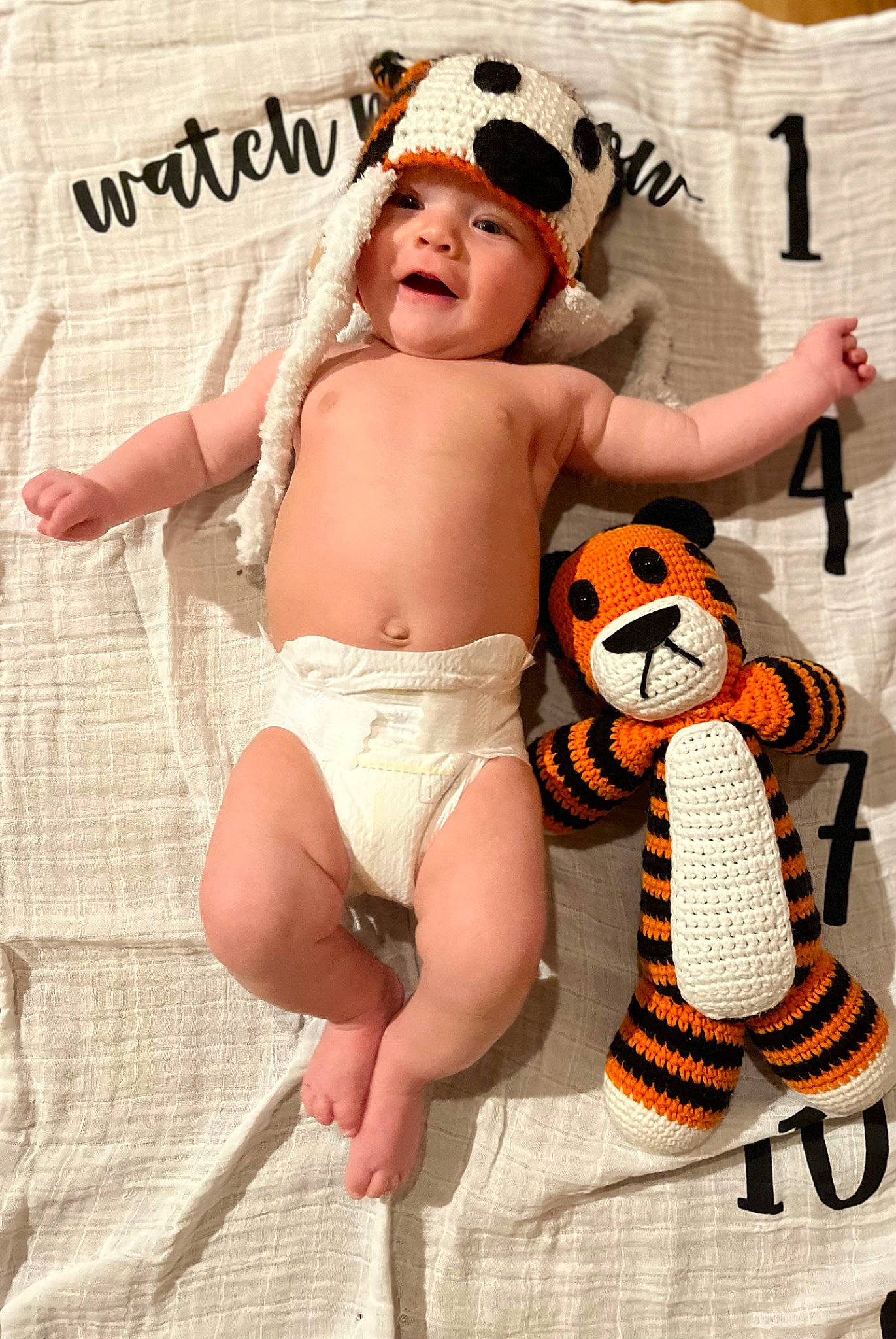 Calvin is registered to the contest to win money with this photo: abdomen, baby, baby_toddler_clothing, barechested, chest, child, diaper, finger, foot, fun, happy, headwear, human_leg, knee, muscle, navel, person, sitting, stomach, thigh