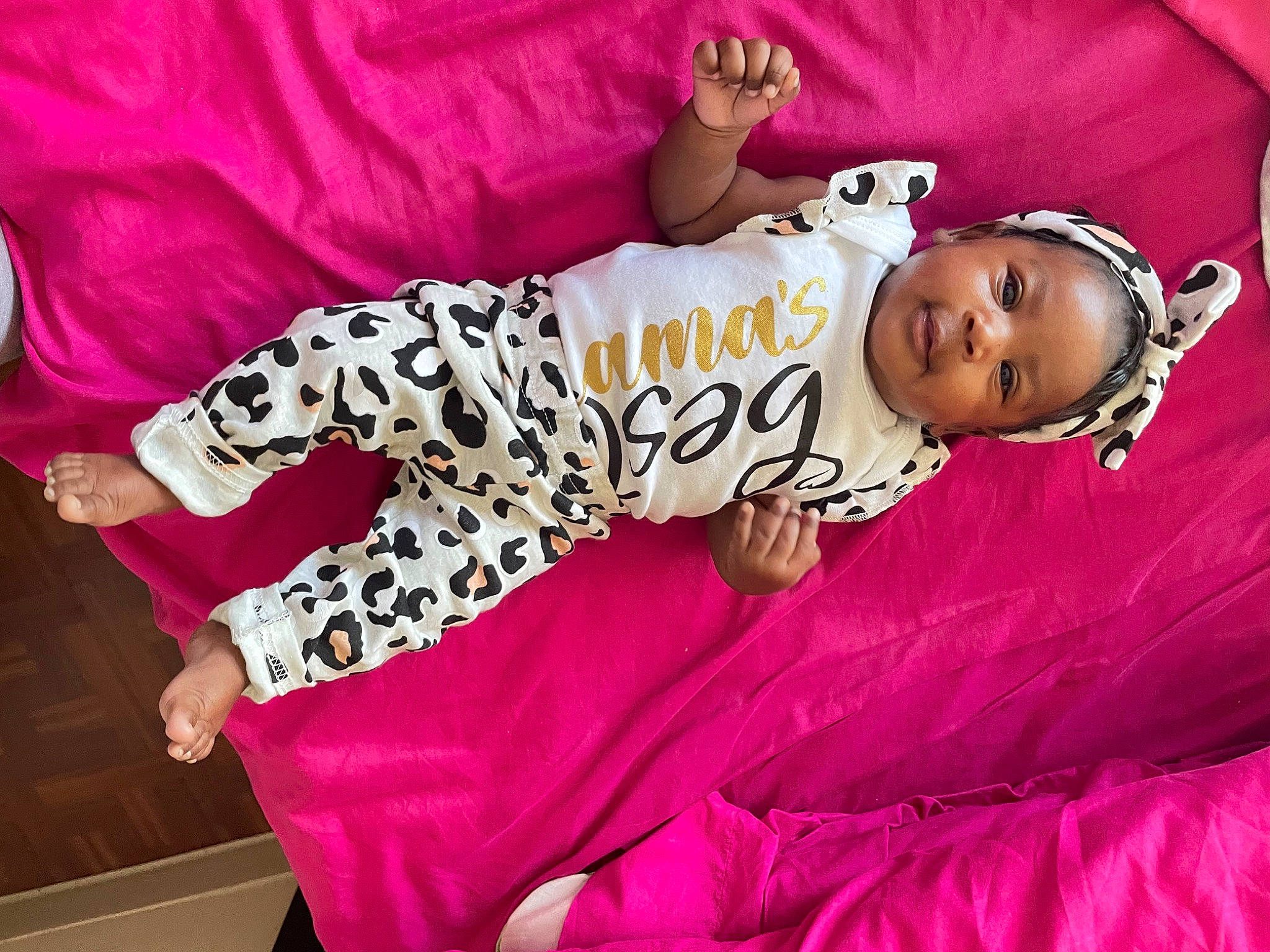 Madisyn is registered to the contest to win money with this photo: baby, baby_toddler_clothing, beauty, child, comfort, couch, dress, event, fun, happy, headwear, human_body, linens, magenta, pattern, person, pink, purple, sleeve, textile