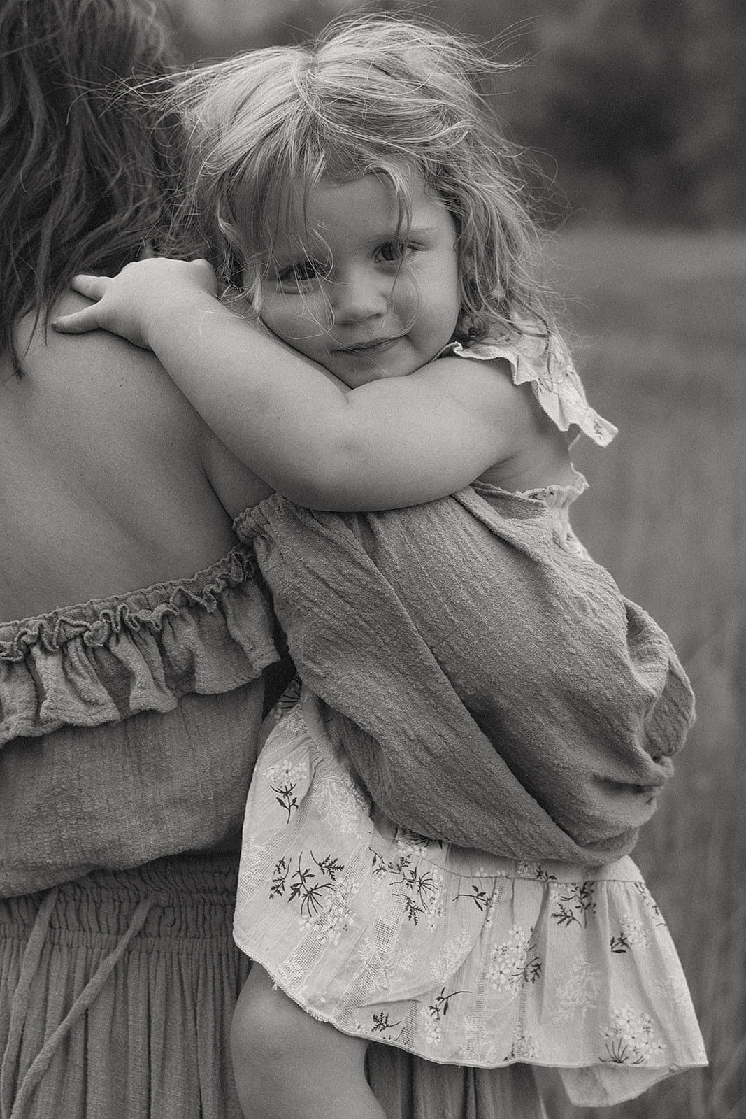 Harleigh joined the competition — help win amazing prizes! black_and_white, child, dress, eye, flash_photography, gesture, grass, hair, hairstyle, happy, head, human_body, organ, people_in_nature, person, plant, skin, standing, style, toddler