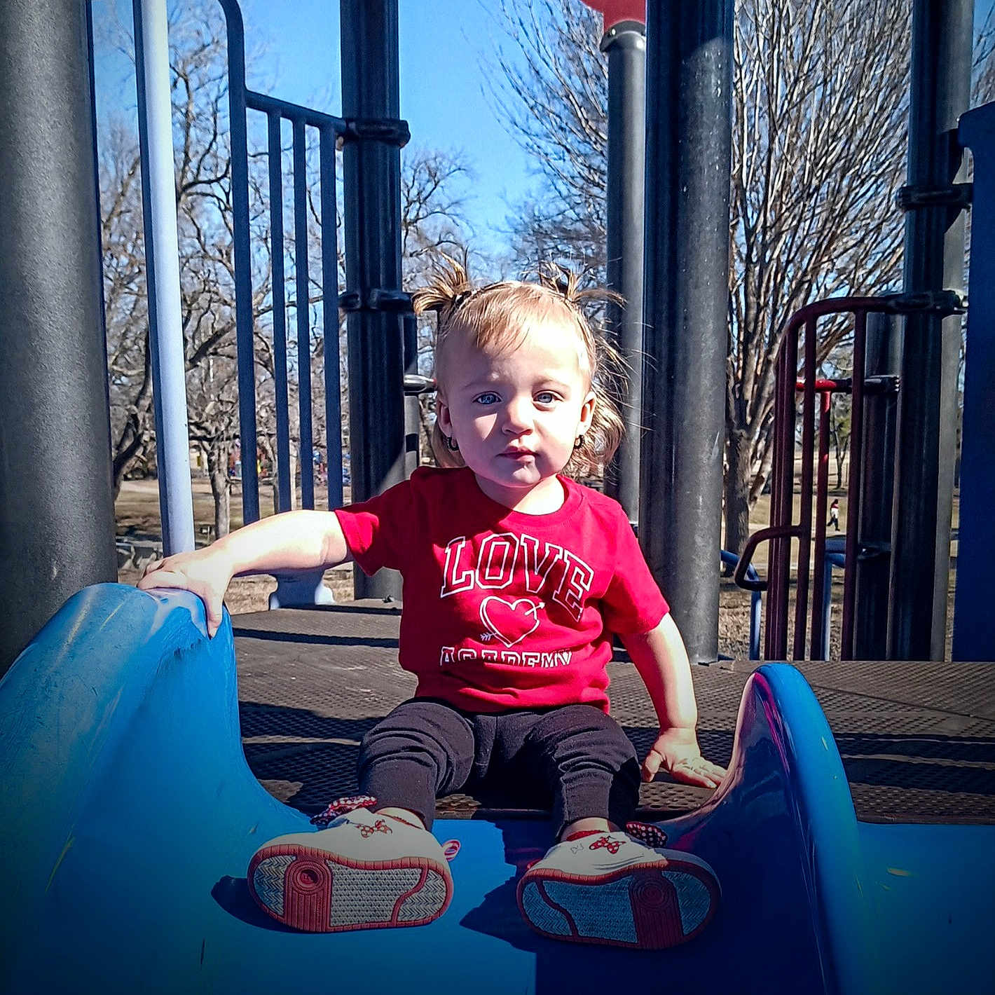 Emma joined the competition — help win amazing prizes! baby, clothing, face, footwear, grass, head, nature, outdoorplayarea, outdoors, pants, park, person, photography, plant, playarea, portrait, shoe, slide, toy, tree