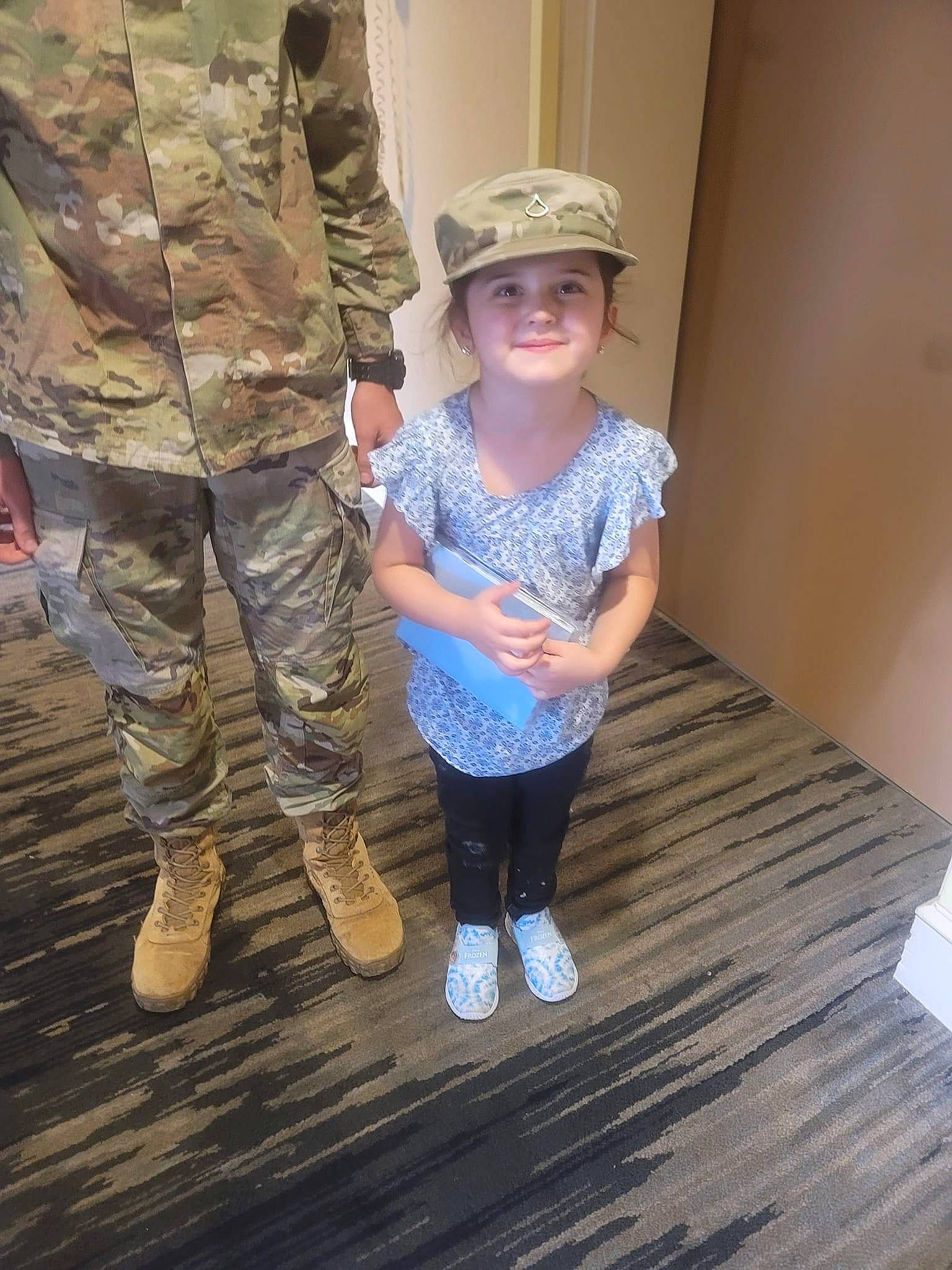 Elizabeth joined the competition — help win amazing prizes! camouflage, cargo_pants, flooring, gesture, happy, hardwood, headwear, human_body, human_leg, joy, leg, leisure, marines, military_camouflage, military_person, military_uniform, pattern, person, smile, sneakers