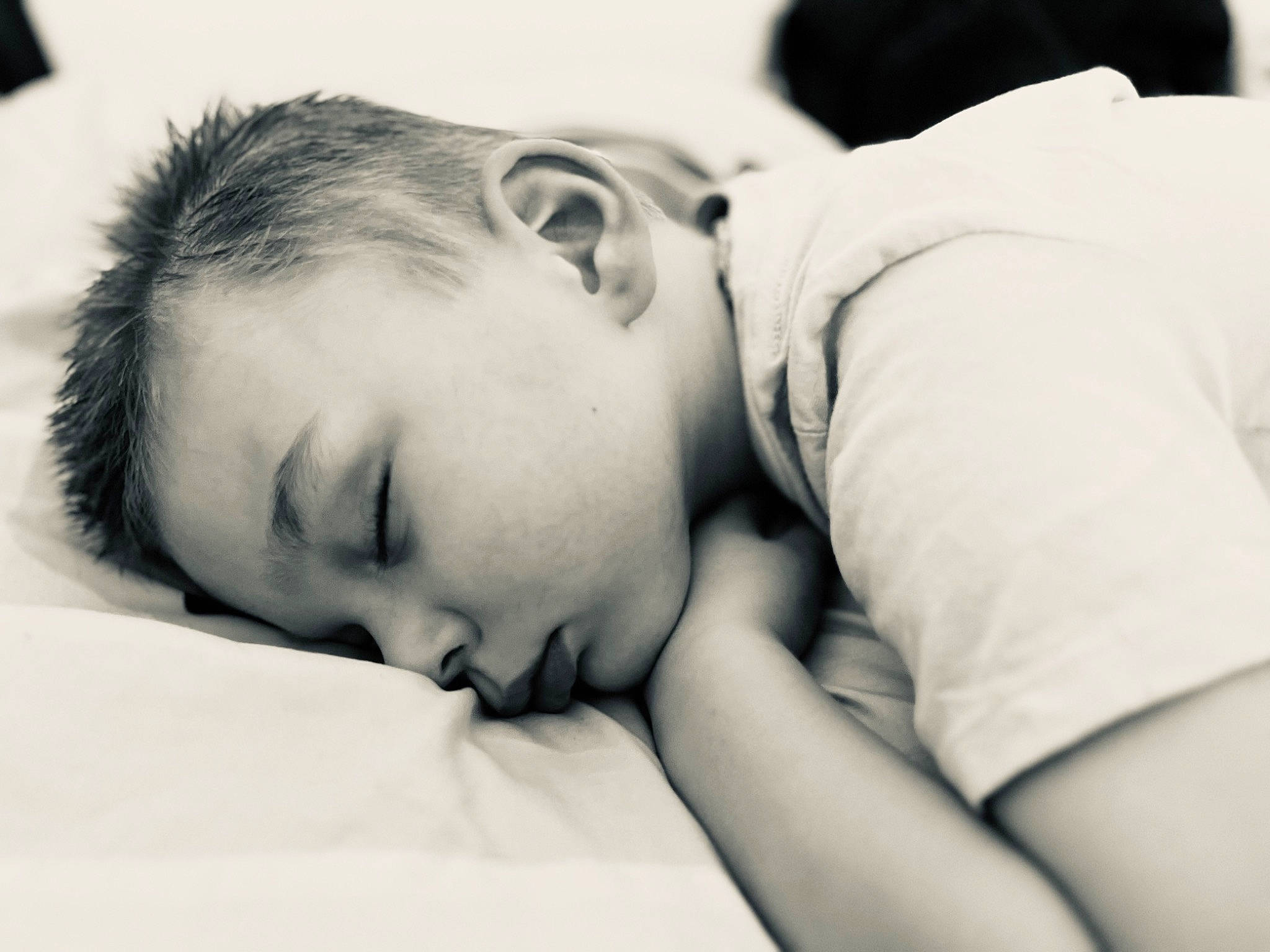 Lucas is registered to the contest to win money with this photo: black_and_white, child, close_up, comfort, elbow, eyelash, flash_photography, forehead, gesture, happy, hug, love, monochrome, monochrome_photography, person, portrait, portrait_photography, romance, sitting, stock_photography