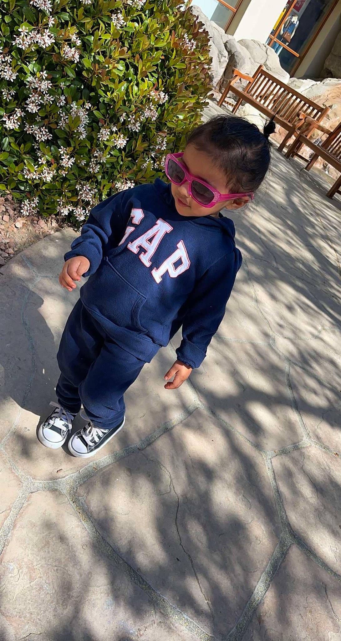 Haley joined the competition — help win amazing prizes! asphalt, denim, electric_blue, eyewear, fun, glasses, goggles, happy, leisure, person, personal_protective_equipment, plant, recreation, sleeve, sportswear, sunglasses, t_shirt, toddler, tree, uniform