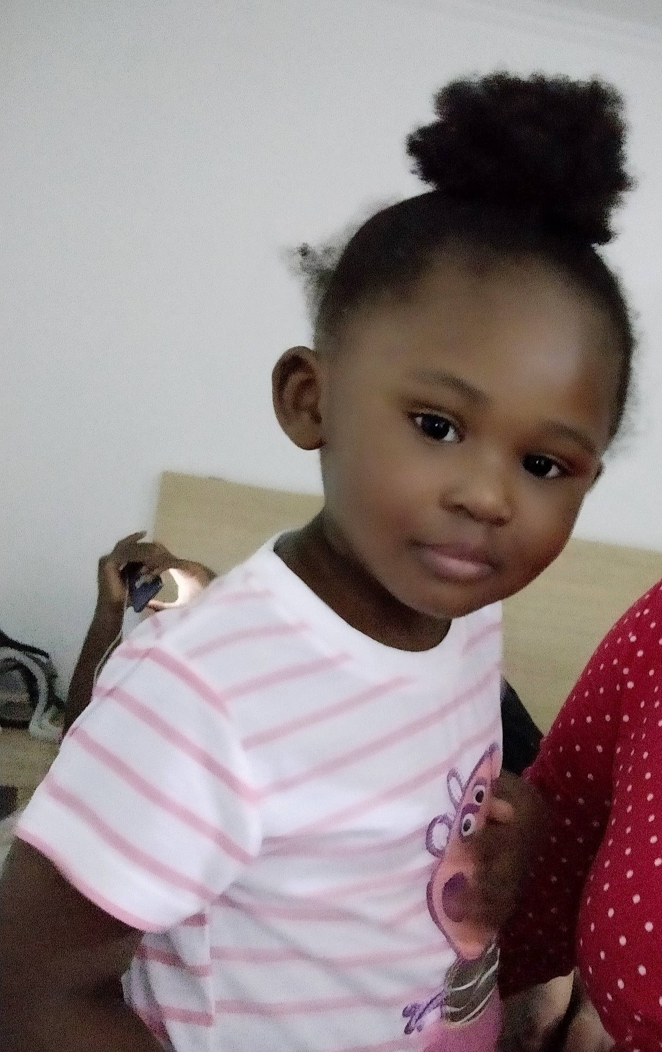 Shaina participe au concours pour gagner de l'argent avec cette photo : black_hair, cheek, child, forehead, hair, hairstyle, neck, person, smile, toddler