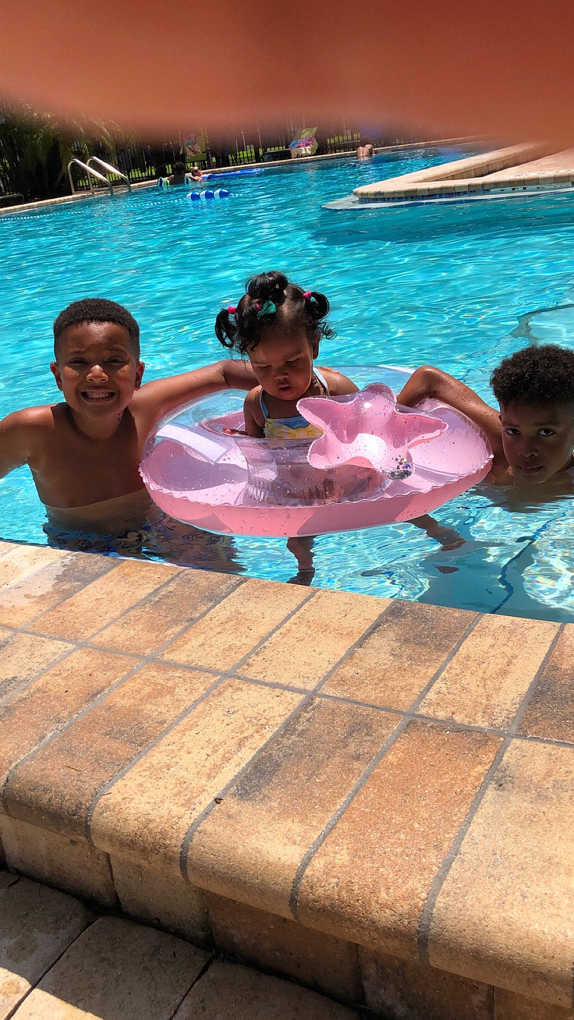 Kyren joined the competition — help win amazing prizes! aqua, azure, beauty, blue, child, event, facial_expression, fun, happy, joy, leisure, morning, nonbuilding_structure, person, photograph, recreation, smile, summer, swimming_pool, toddler