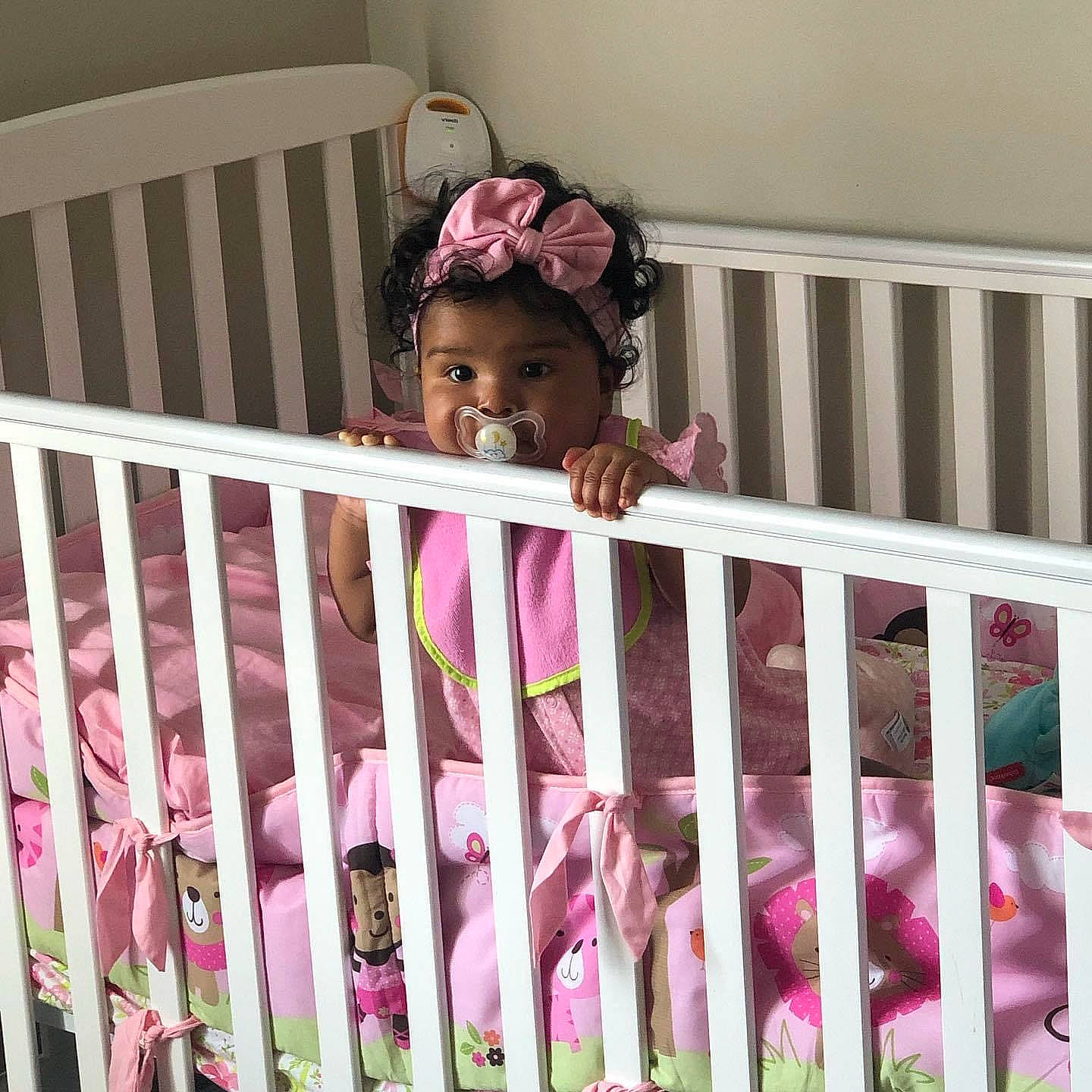 Adrienne joined the competition — help win amazing prizes! baby, baby_products, baby_safety, baby_toddler_clothing, bed, comfort, cradle, facial_expression, fence, happy, infant_bed, linens, magenta, nursery, person, pink, product, smile, textile, toddler