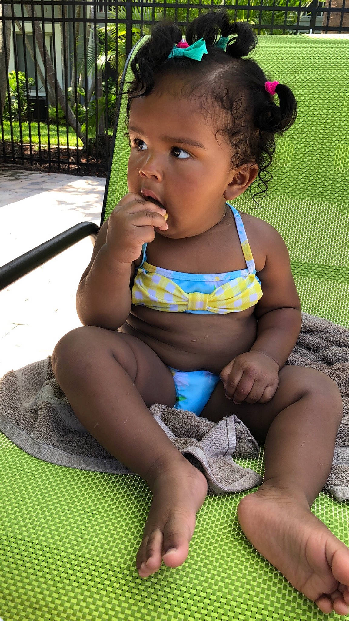 Adrienne is registered to the contest to win money with this photo: adaptation, barefoot, black, black_hair, face, facial_expression, fun, grass, green, hairstyle, hand, happy, knee, leg, leisure, organ, person, skin, summer, thigh