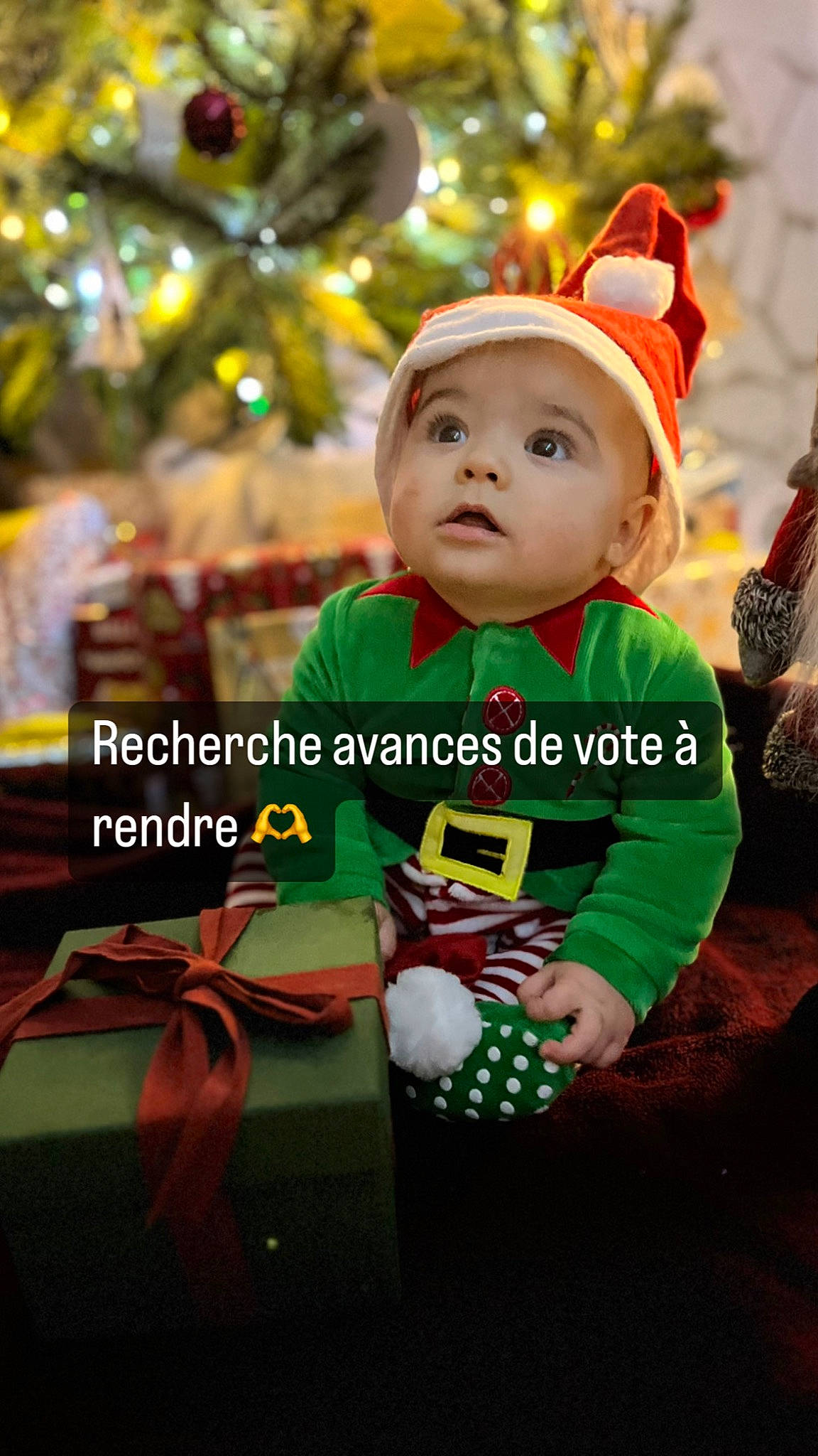 Leonardo participe au concours pour gagner de l'argent avec cette photo : baby, baby_toddler_clothing, child, christmas, christmas_decoration, christmas_eve, christmas_ornament, christmas_tree, event, fictional_character, fun, happy, headwear, holiday, holiday_ornament, interior_design, ornament, person, plant, toddler