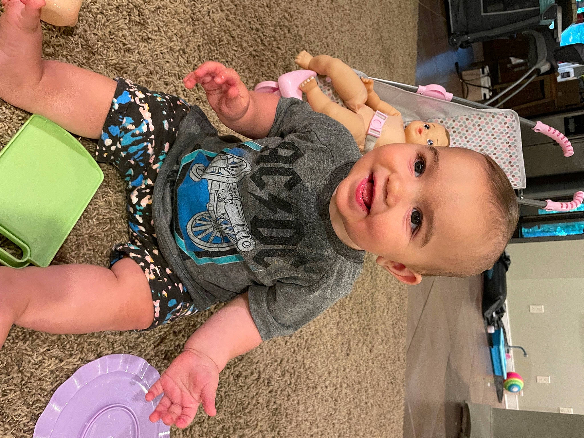 Cameron joined the competition — help win amazing prizes! baby, child, eyewear, finger, flooring, fun, grass, happy, human_leg, joy, leisure, mouth, pattern, person, play, sand, sitting, smile, soil, t_shirt