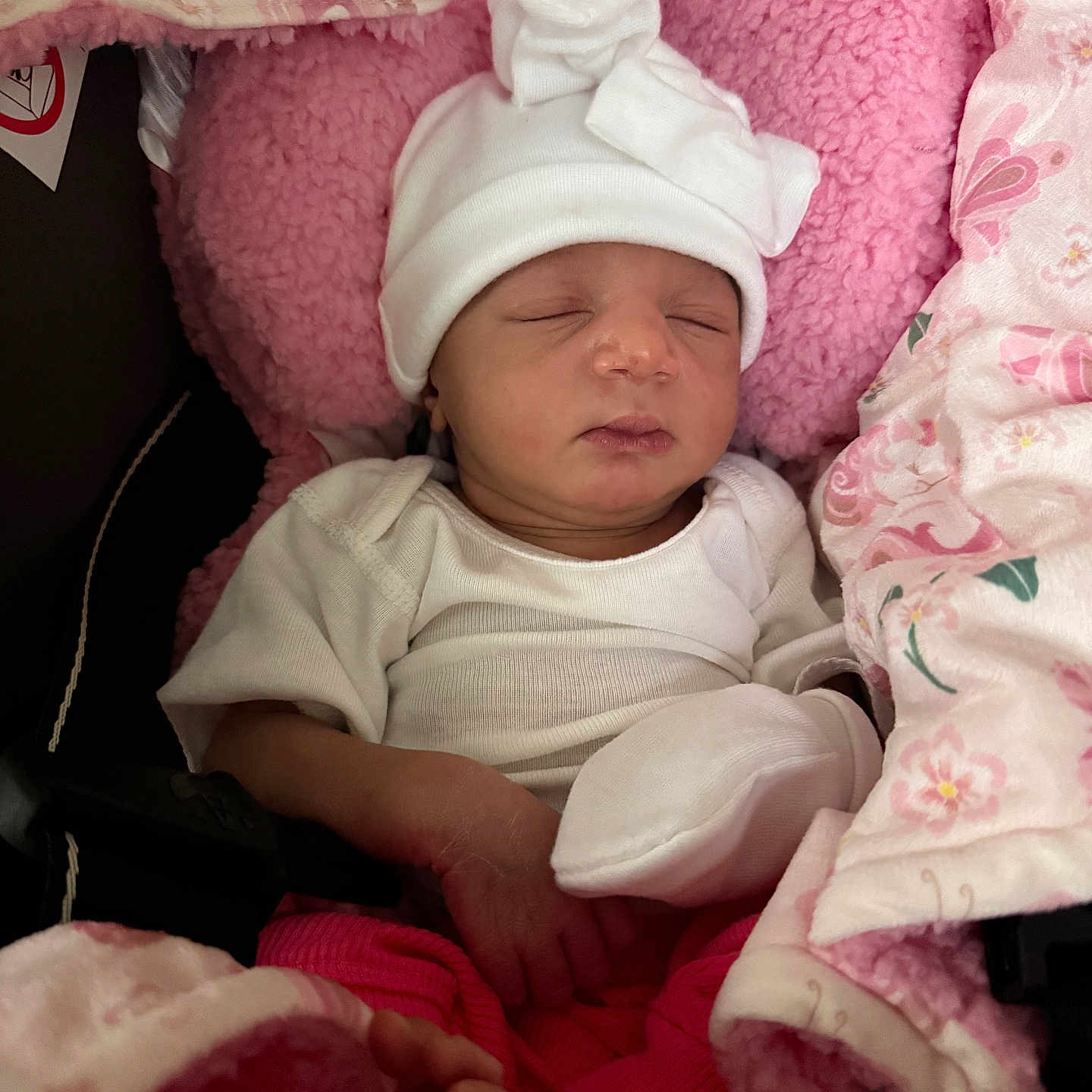 Keona is registered to the contest to win money with this photo: baby, blanket, child, closeup, cozy, cute, hat, indoors, infant, newborn, peaceful, person, pink_blanket, resting, sleep, sleeping, soft_texture, toddler, white_clothing, wrapped