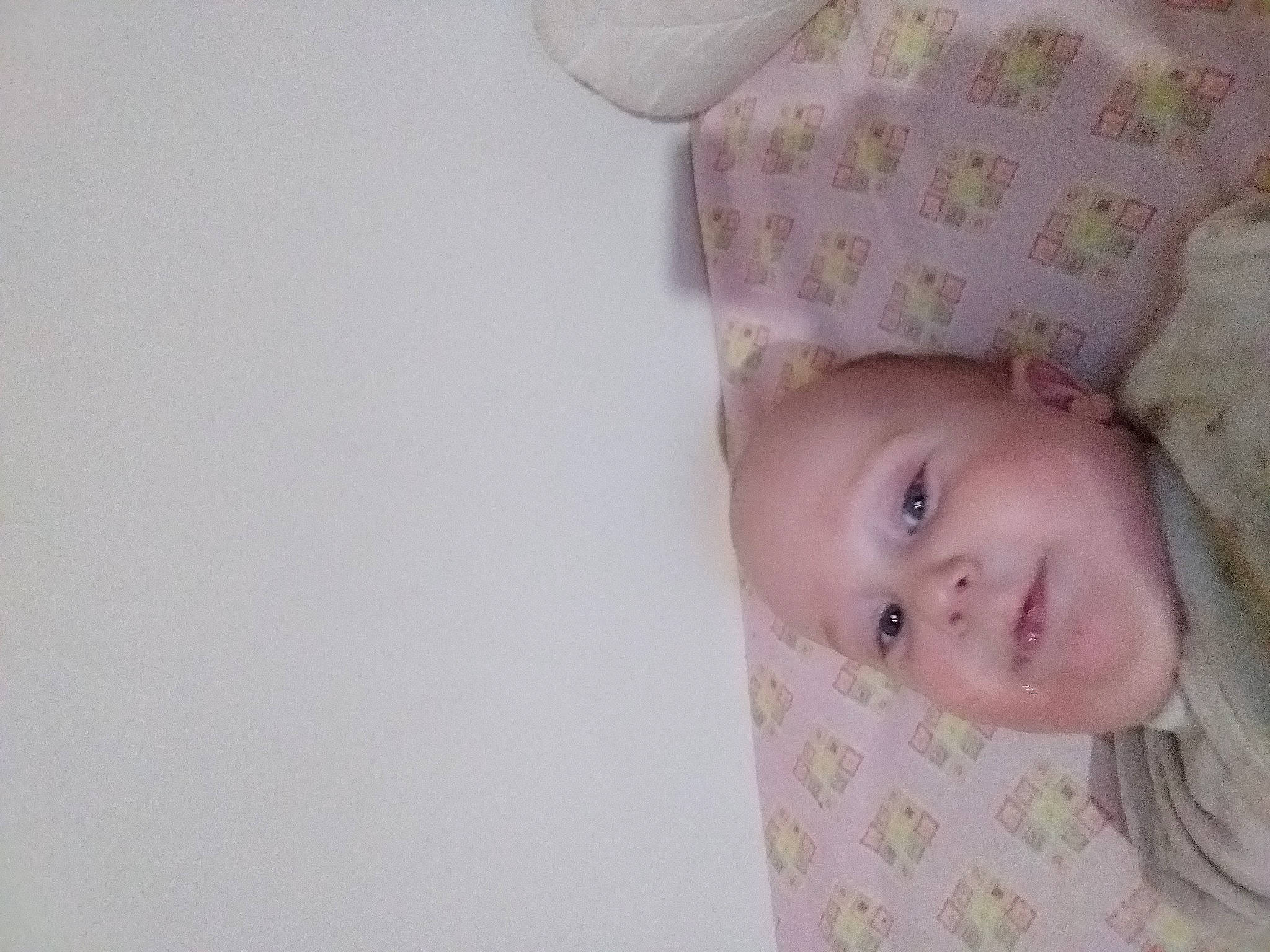 Angel a rejoint le concours — aidez-le/la à gagner de superbes lots ! baby, baby_products, baby_toddler_clothing, cheek, child, comfort, eyelash, iris, linens, lip, neck, nose, pattern, person, portrait_photography, sitting, sleeve, smile, toddler, wood