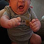 Bobbie joined the competition — help win amazing prizes! baby, infant, onesie, grey_clothing, cute, face, hand, foot, expression, indoor, person, child, newborn, fist, hair, sitting, yawn, mouth_open, skin, tiny