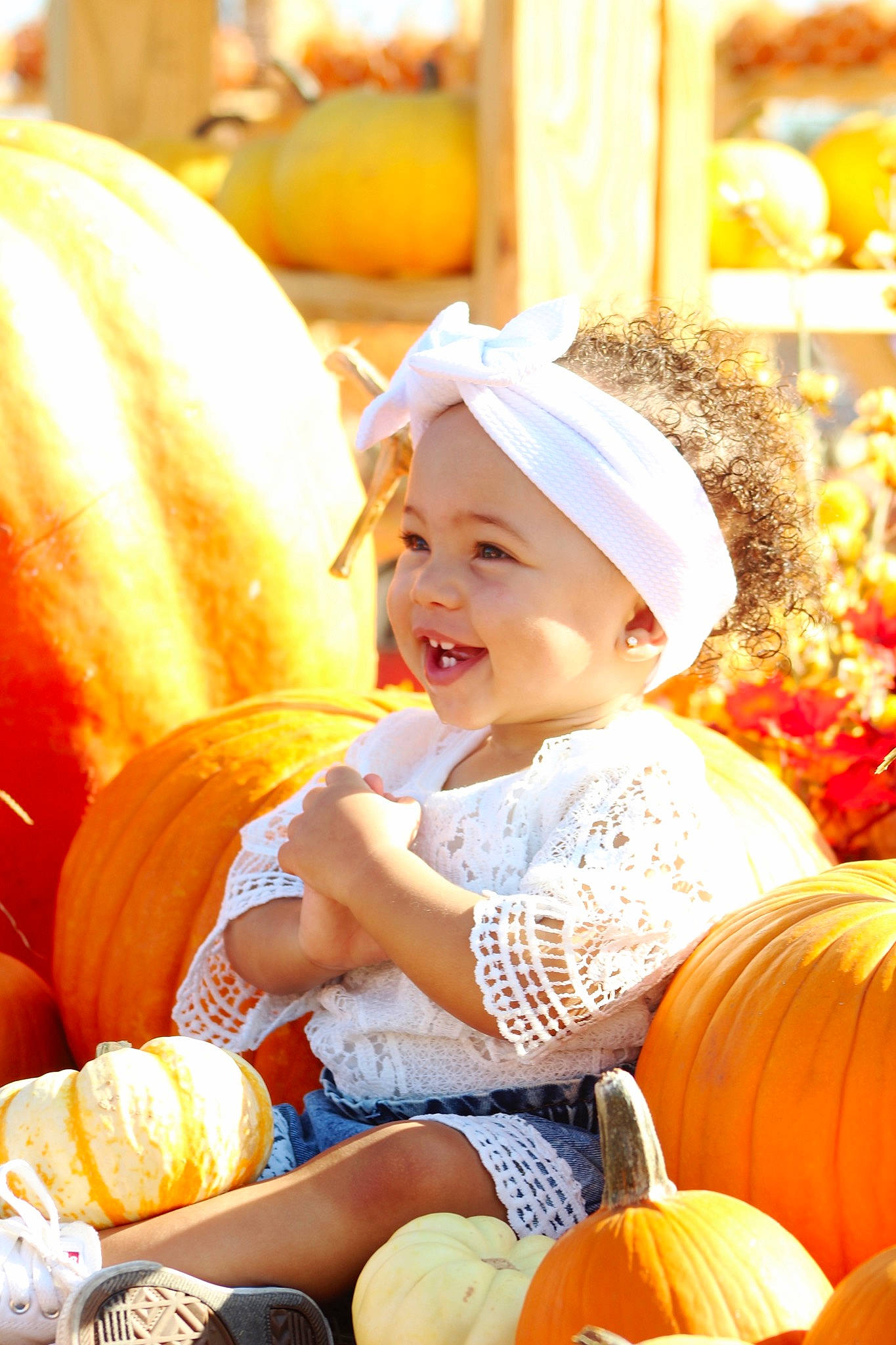 Alexandria joined the competition — help win amazing prizes! baby_toddler_clothing, calabaza, cucurbita, facial_expression, fun, gourd, happy, headwear, natural_foods, orange, people, person, photograph, plant, pumpkin, shorts, smile, squash, toddler, vegetable