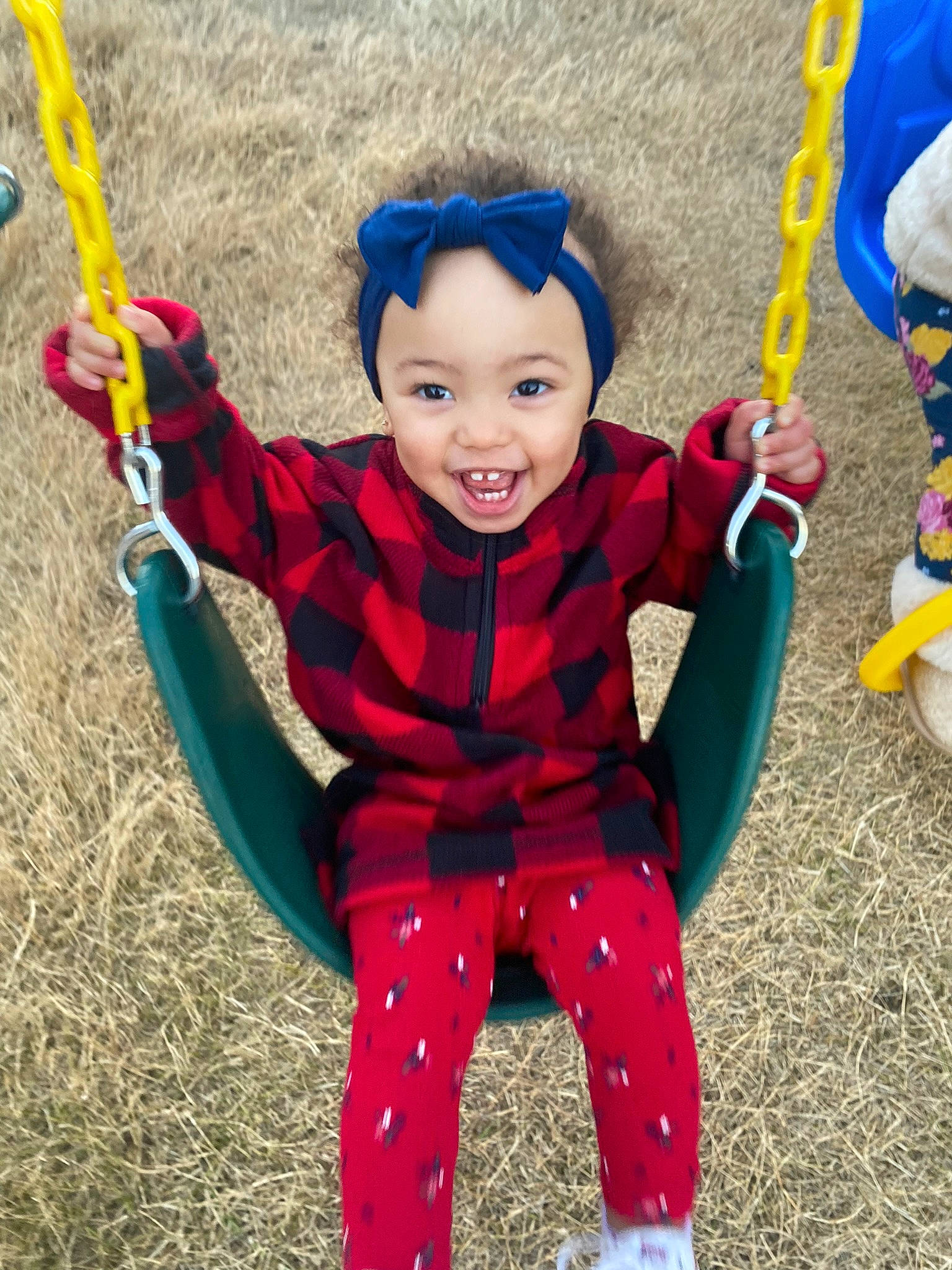 Alexandria joined the competition — help win amazing prizes! baby, baby_toddler_clothing, blue, child, cool, electric_blue, fun, grass, happy, head, human_body, leisure, people_in_nature, person, photograph, product, recreation, smile, swing, toddler