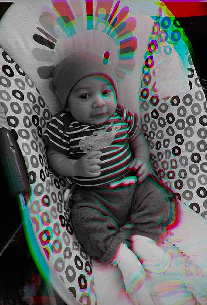 Cartier is registered to the contest to win money with this photo: baby, baby_products, baby_toddler_clothing, chair, child, circle, comfort, cool, eye, facial_expression, fashion_accessory, fun, head, headwear, magenta, pattern, person, pink, sitting, sleeve