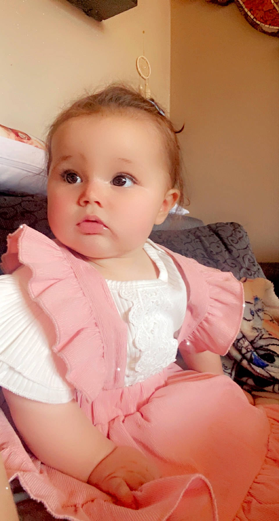 Thalianna participe au concours pour gagner de l'argent avec cette photo : baby, baby_toddler_clothing, cheek, chin, clothing, dress, eye, eyebrow, eyelash, finger, flash_photography, head, iris, lip, neck, person, pink, product, skin, sleeve