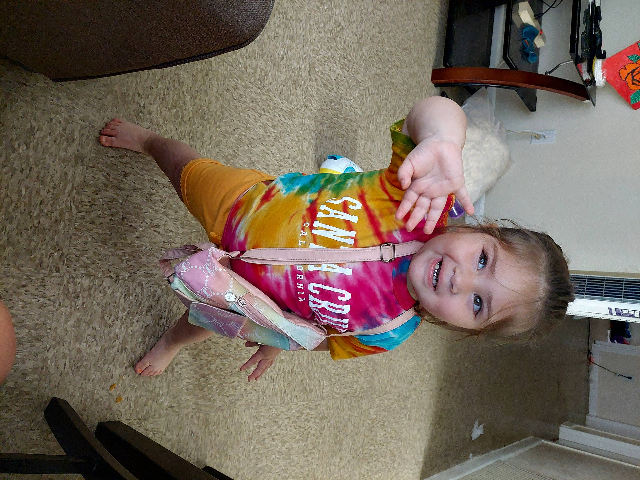 Vanellope joined the competition — help win amazing prizes! baby, baby_products, baby_toddler_clothing, cabinetry, child, comfort, finger, flooring, foot, fun, happy, human_leg, joy, knee, person, play, room, shelf, smile, thigh