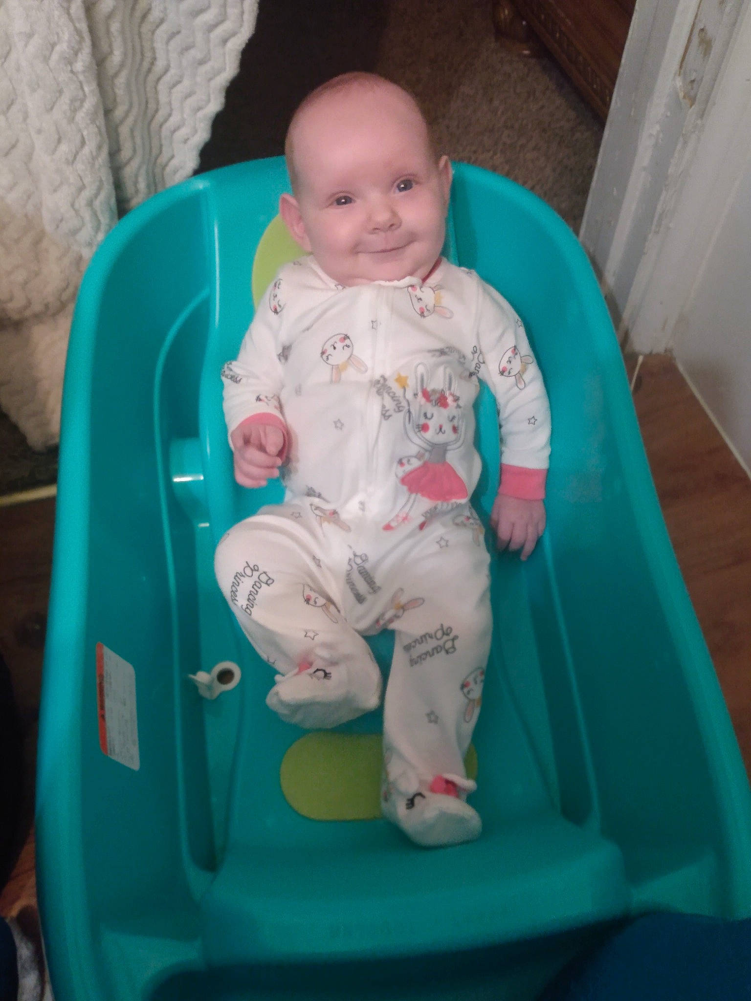 Lillith is registered to the contest to win money with this photo: arm, baby, baby_products, baby_safety, baby_toddler_clothing, baby_toys, cheek, child, comfort, fun, head, joy, leg, person, pink, play, sitting, sleeve, smile, sock