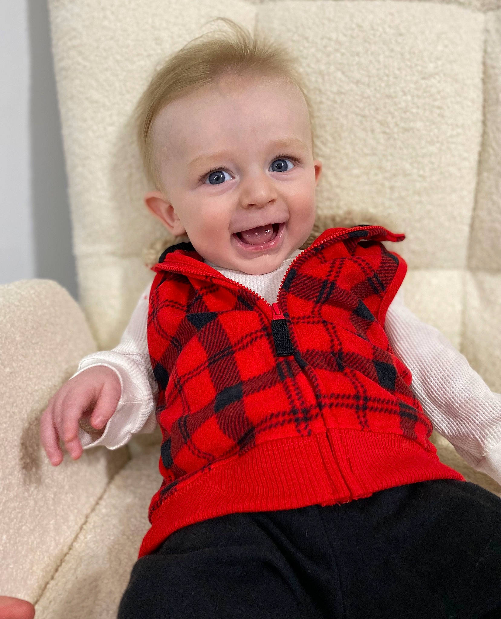 Roman is registered to the contest to win money with this photo: baby, baby_toddler_clothing, cheek, child, collar, comfort, flash_photography, flooring, happy, knee, neck, pattern, person, plaid, sitting, sleeve, smile, t_shirt, tartan, toddler